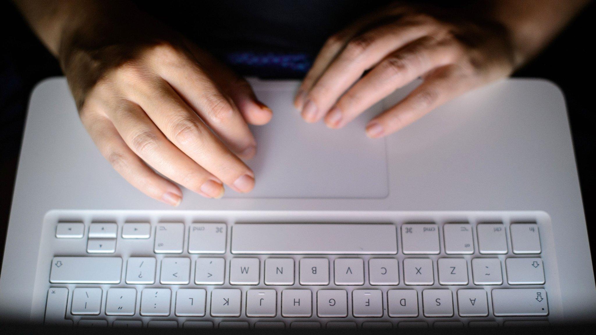 Hands on a keyboard