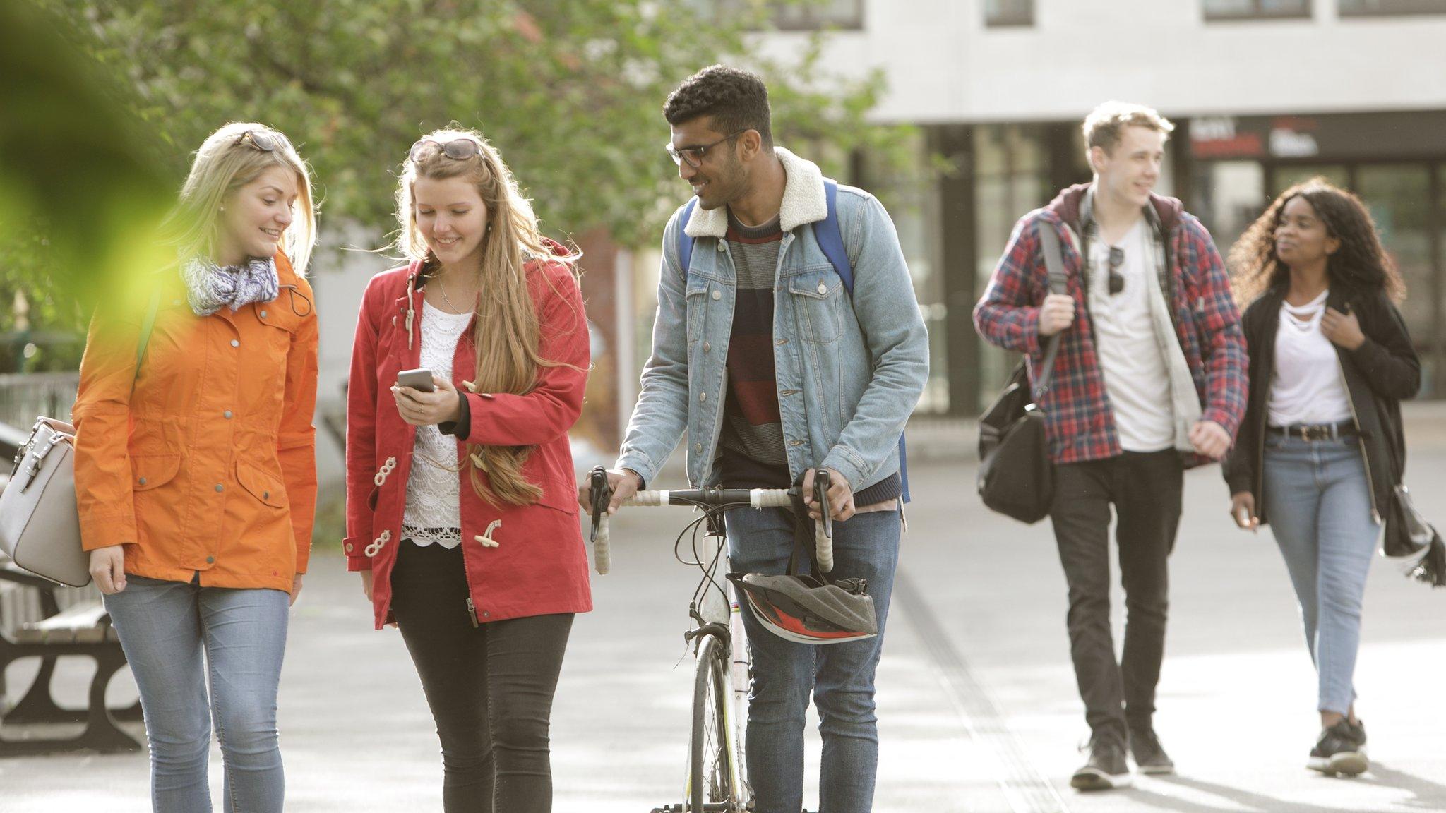 Students walking outside university