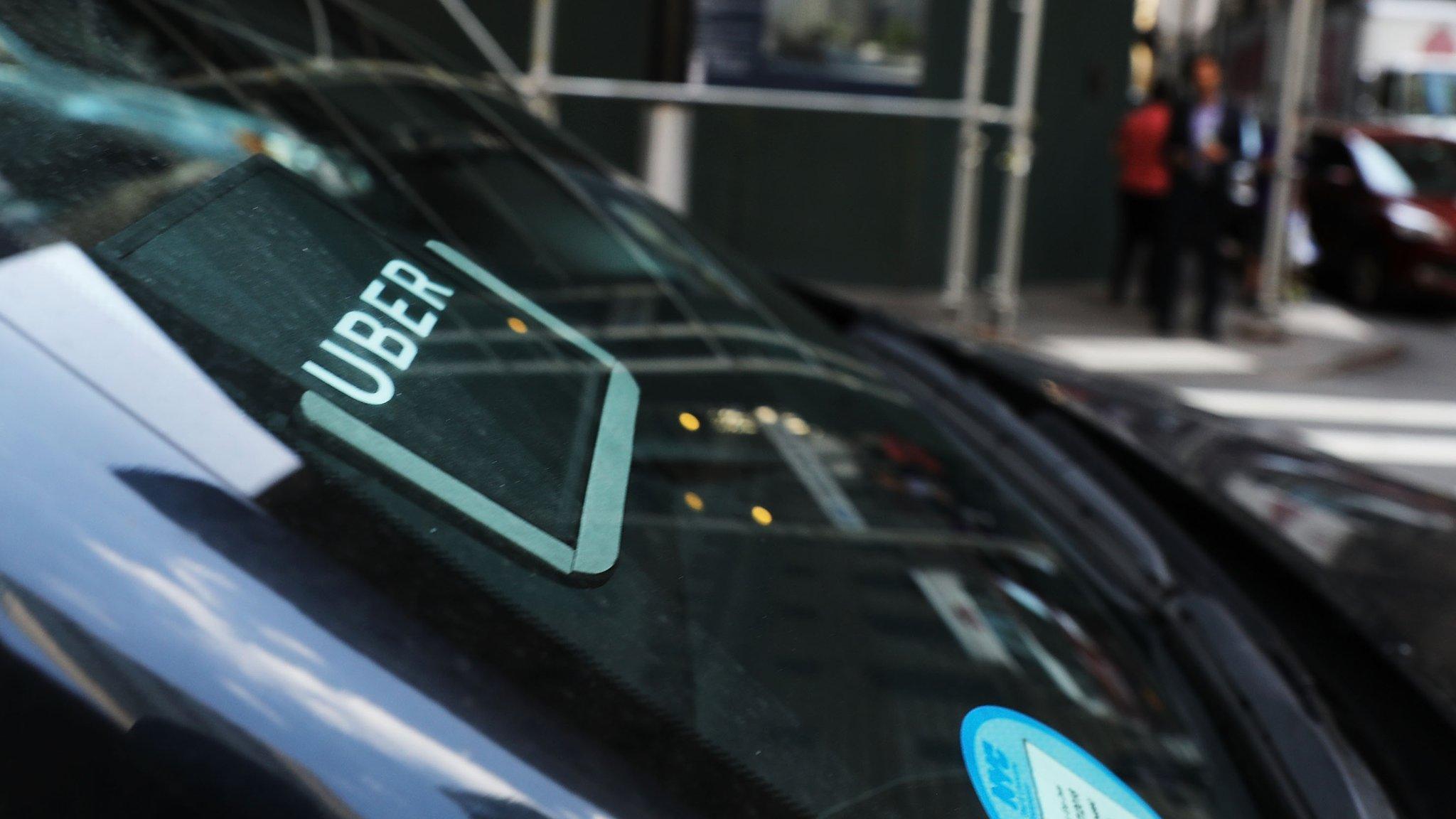 An Uber car waits for a client in Manhattan