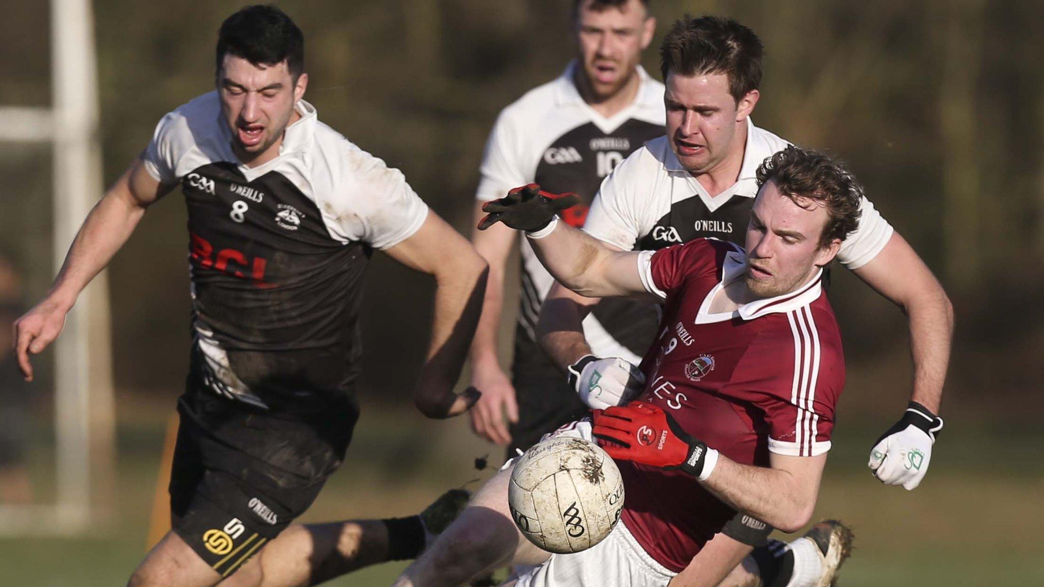 Slaughtneil's Padraig Cassidy is tackled in the London quarter-final