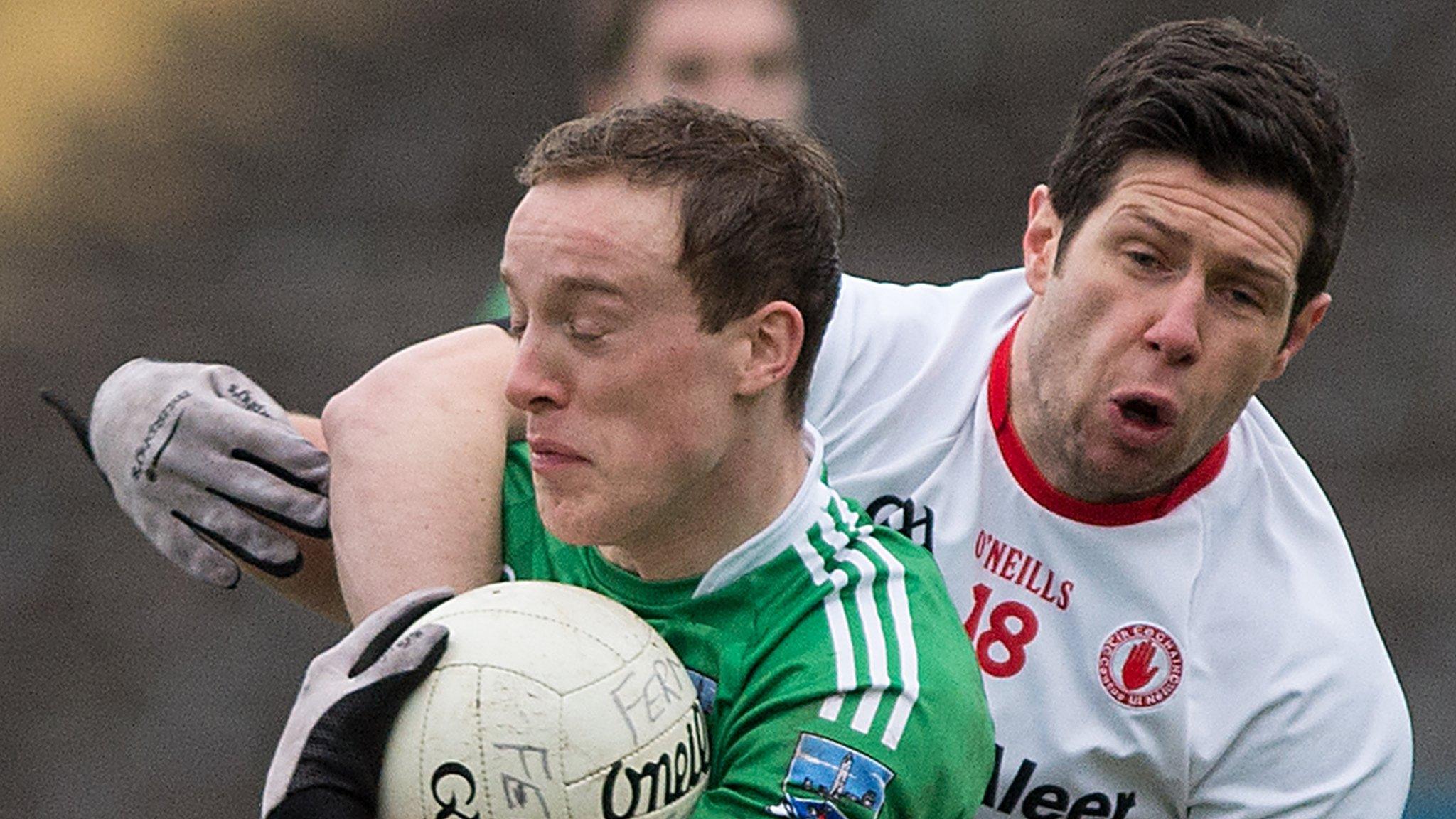 Fermanagh's Che Cullen battles with Tyrone's Sean Cavanagh in this year's Dr McKenna Cup semi-final