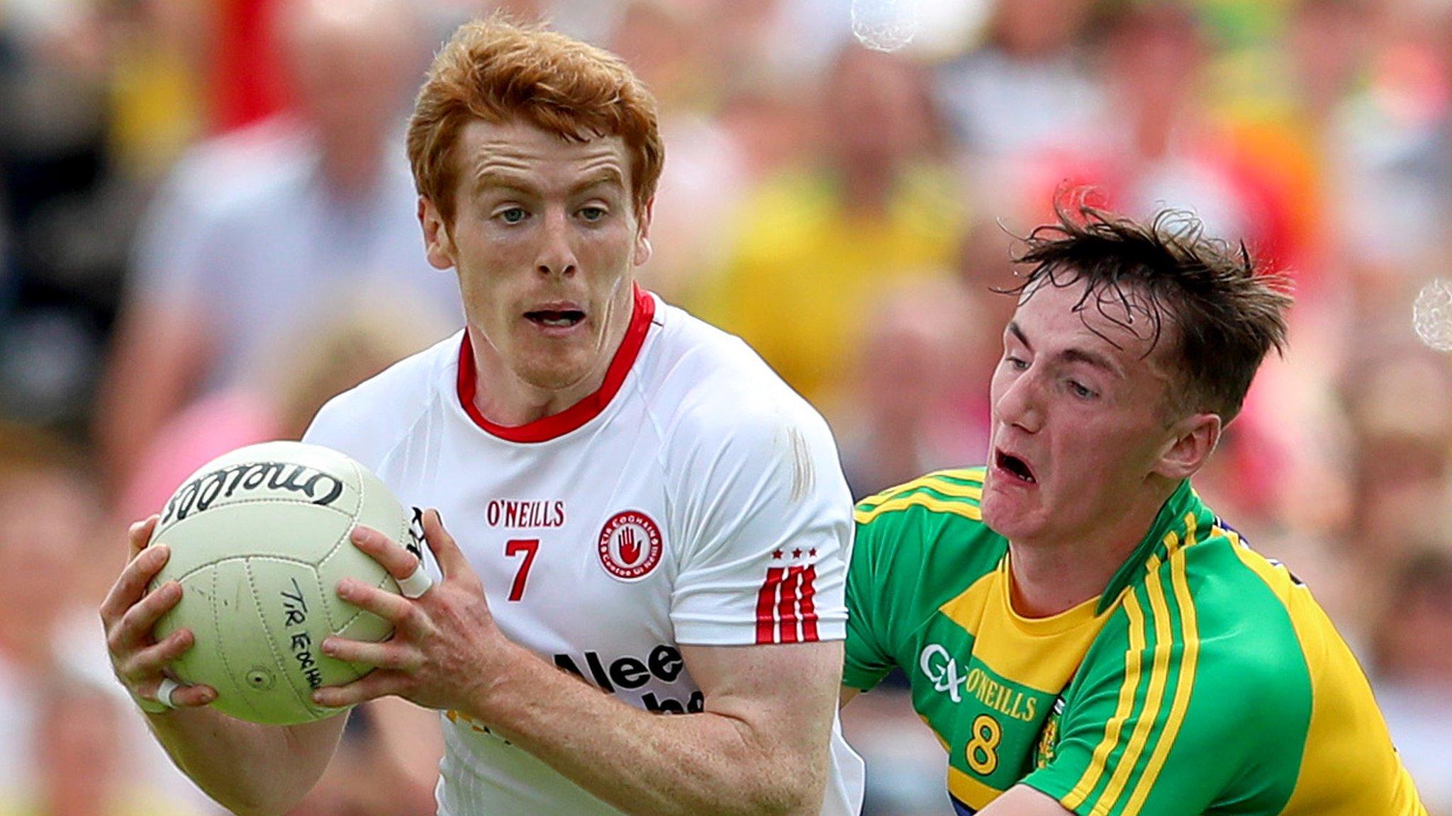 Peter Harte and Jason McGee in action at Clones