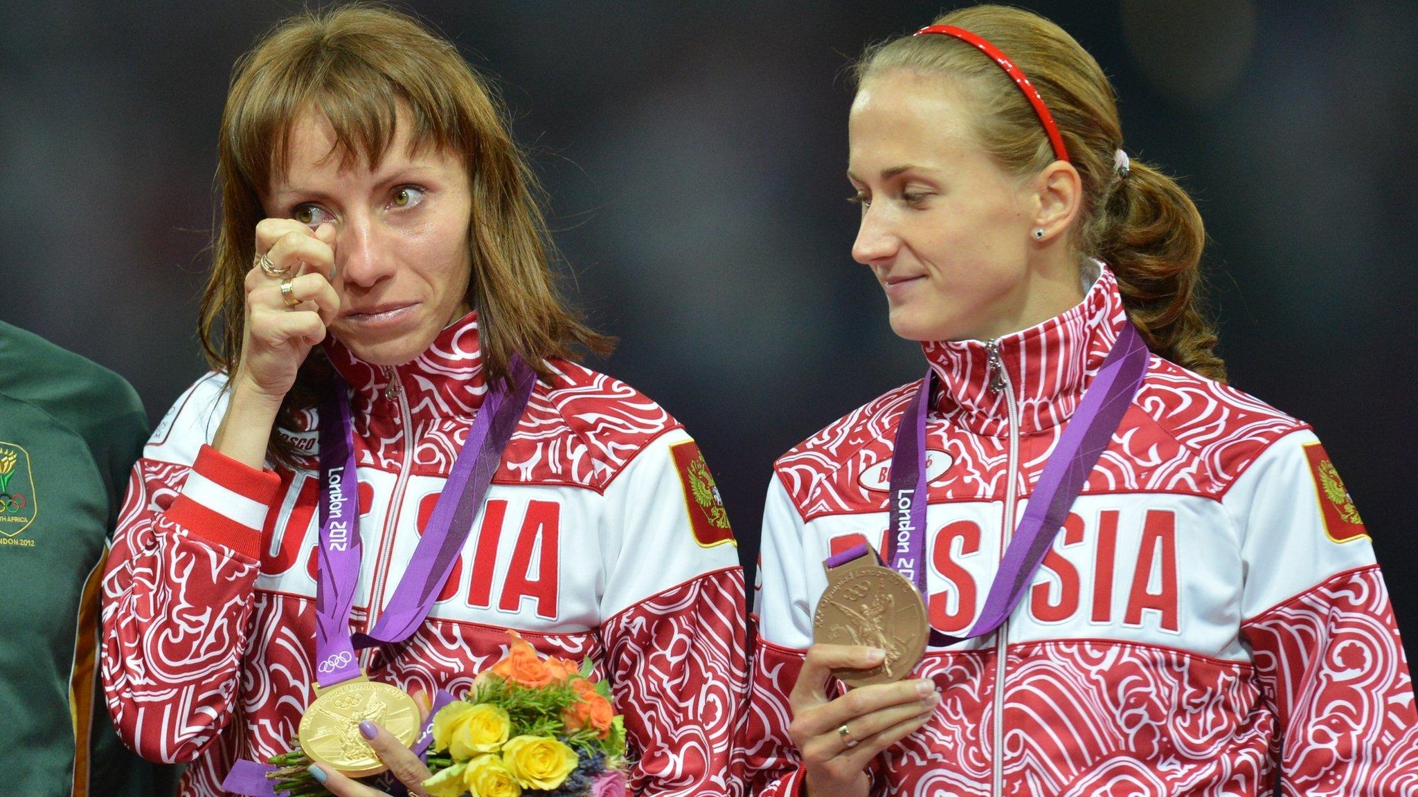 Mariya Savinova (left) and Ekaterina Poistogova celebrate at London 2012