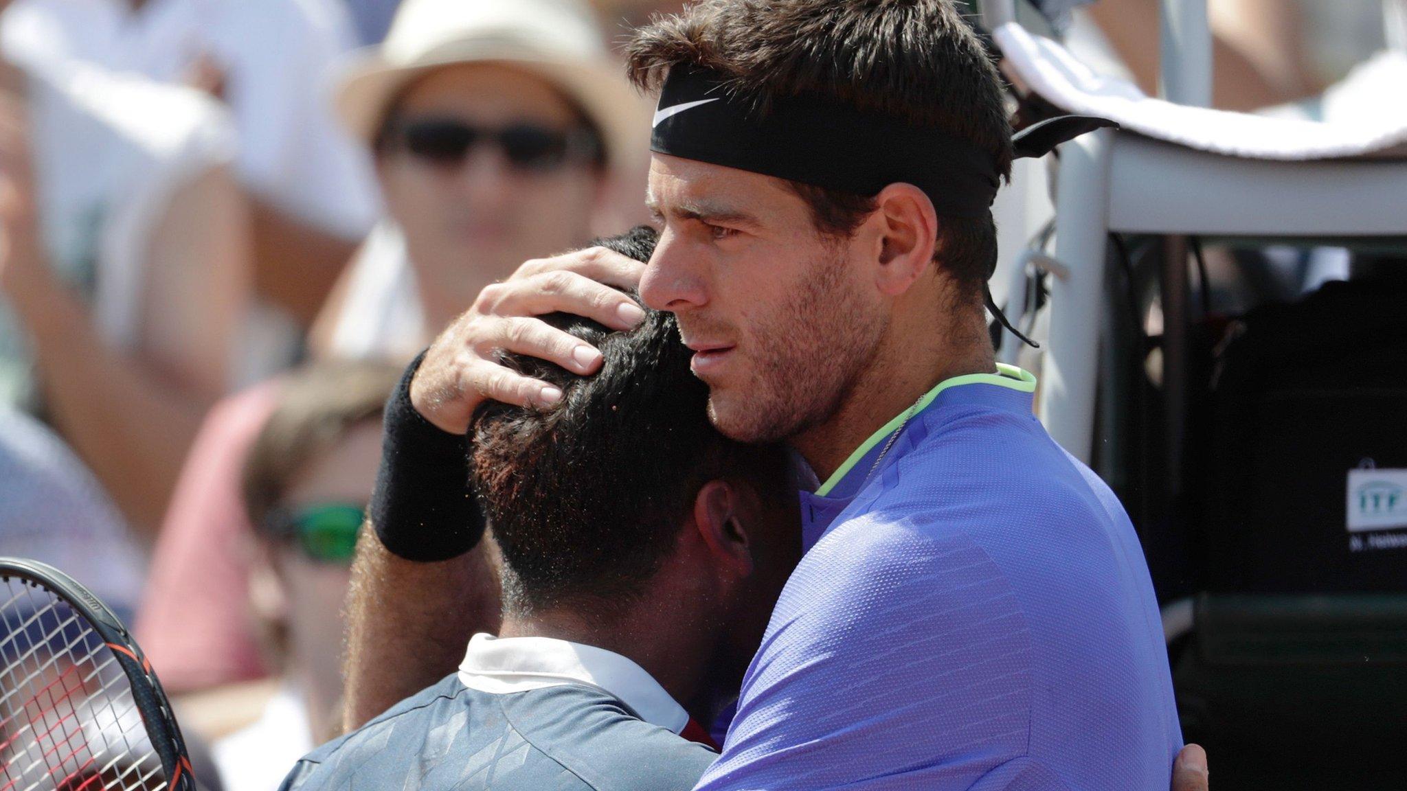 Del Potro and Almagro embrace