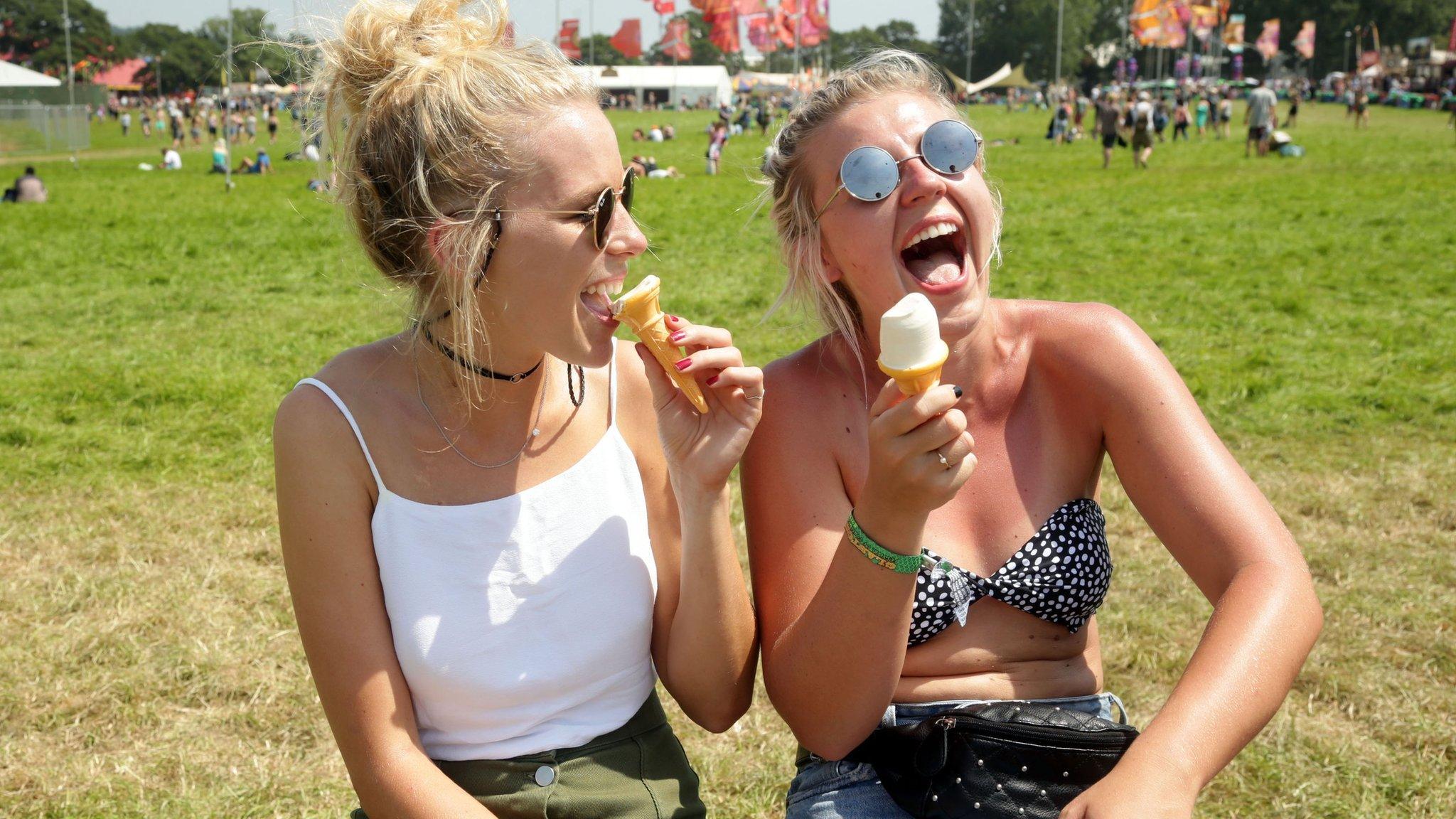 Revellers enjoy ice cream at Glastonbury