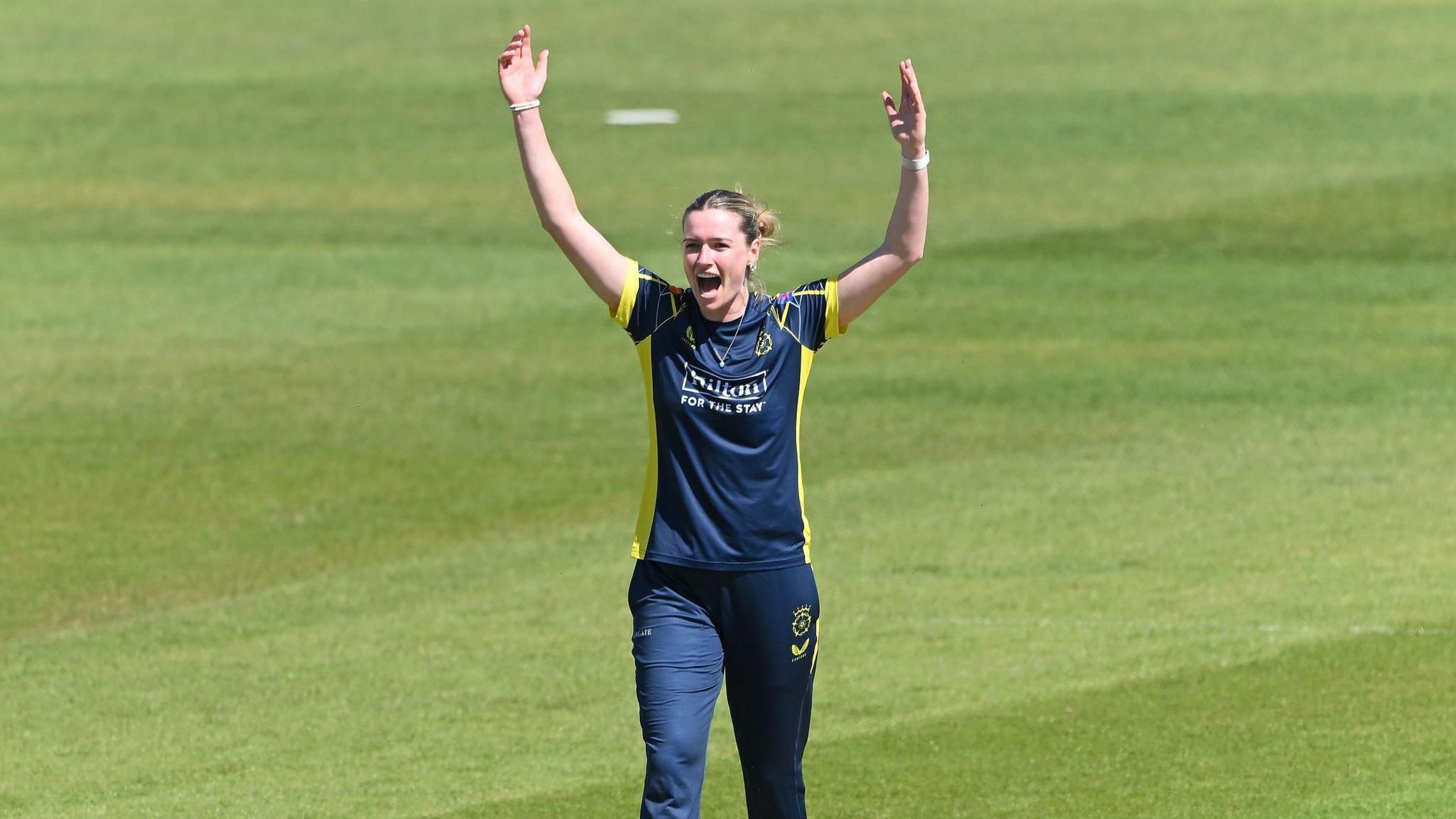 Lauren Bell celebrating taking a wicket for Hampshire.