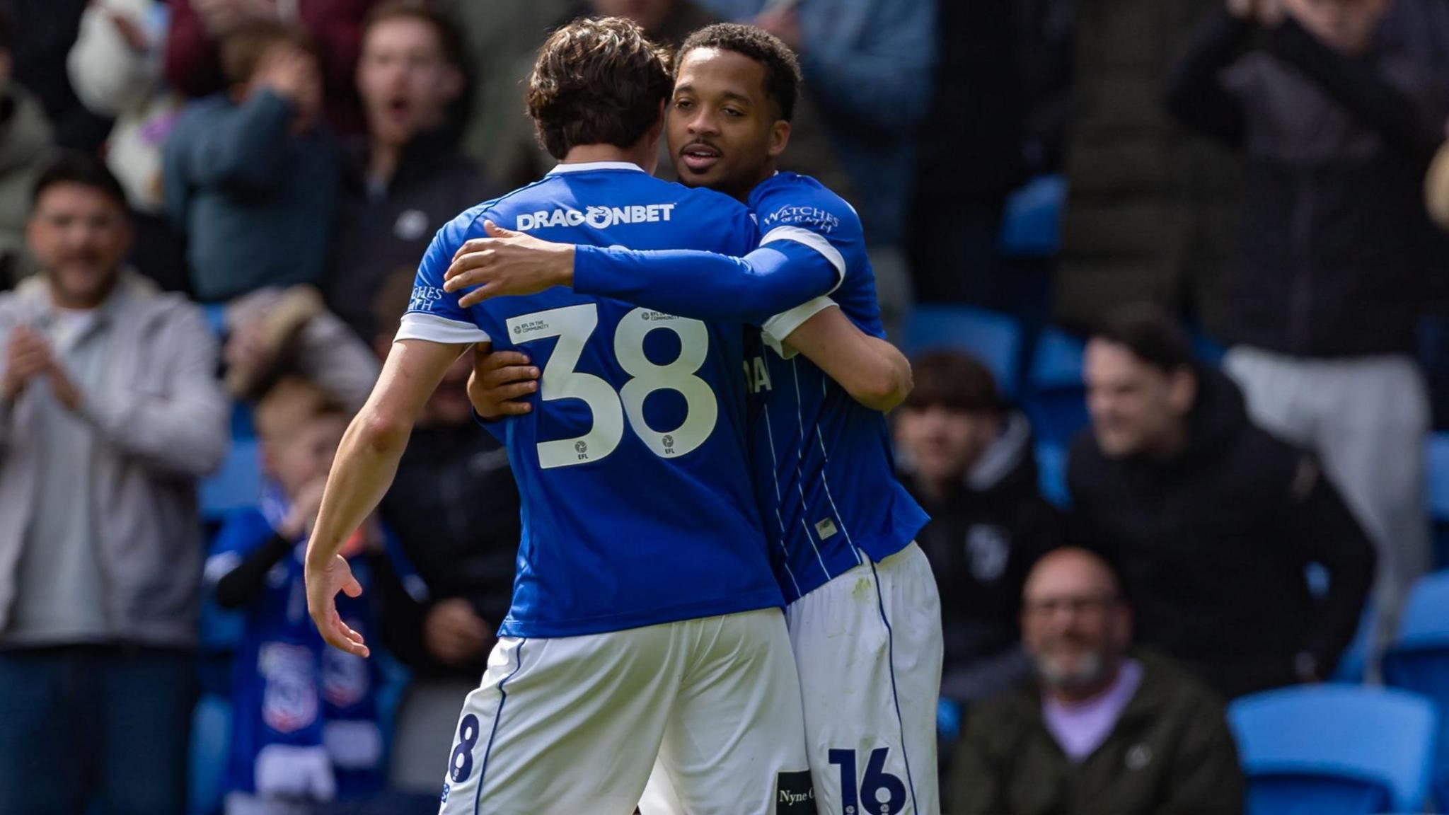 Chris Willock celebrates scoring Cardiff's second goal against Bolton.