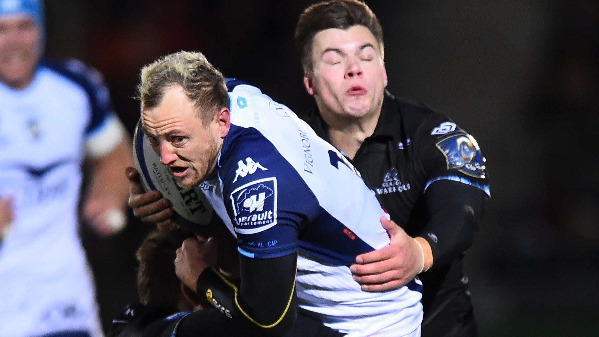 Montpellier's Jesse Mogg is tackled by Huw Jones of Glasgow