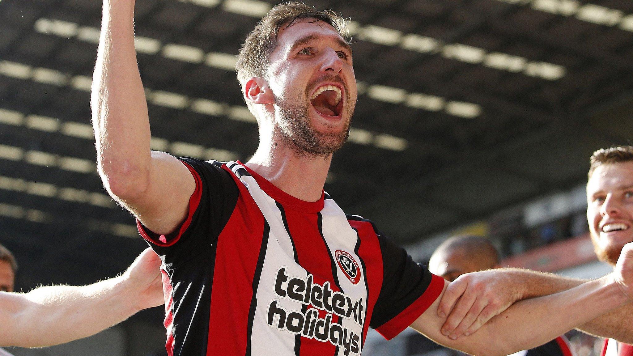 Chris Basham celebrates his goal for Sheffield United