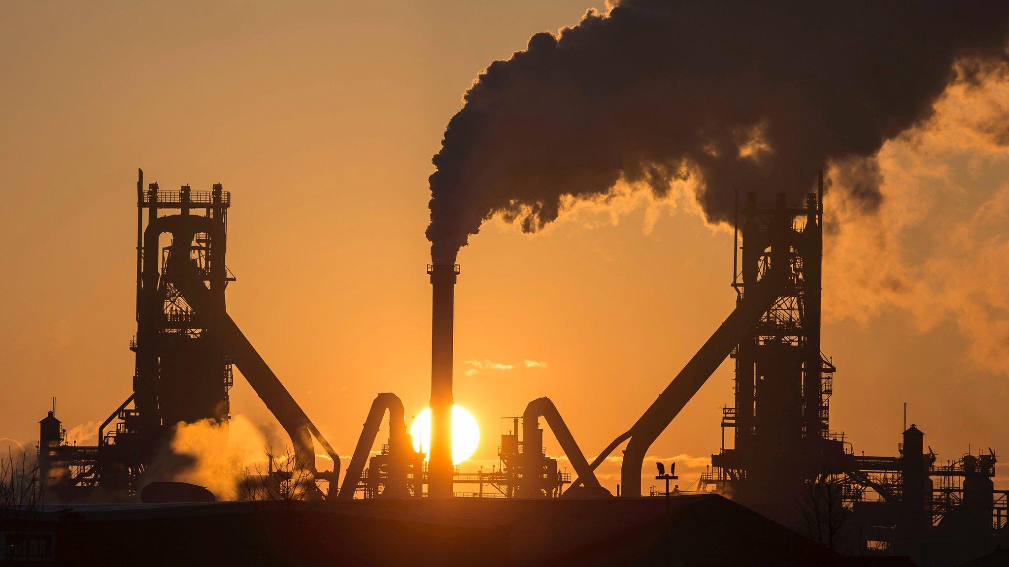 The sun rises above the Scunthorpe steelworks