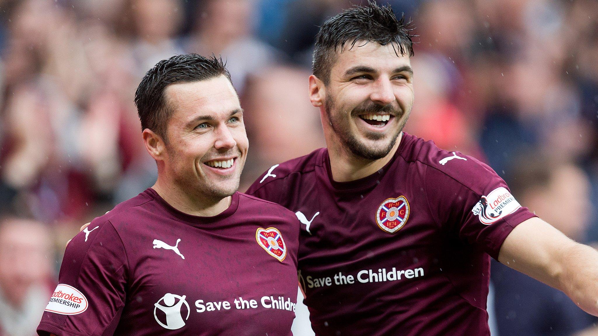 Hearts' Don Cowie and Callum Paterson celebrate