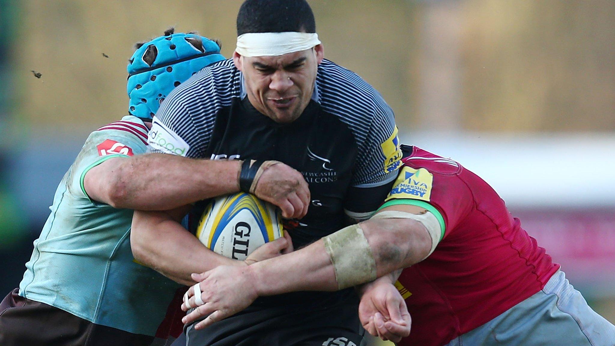 Newcastle Falcons centre Josh Matavesi carries the ball into contact