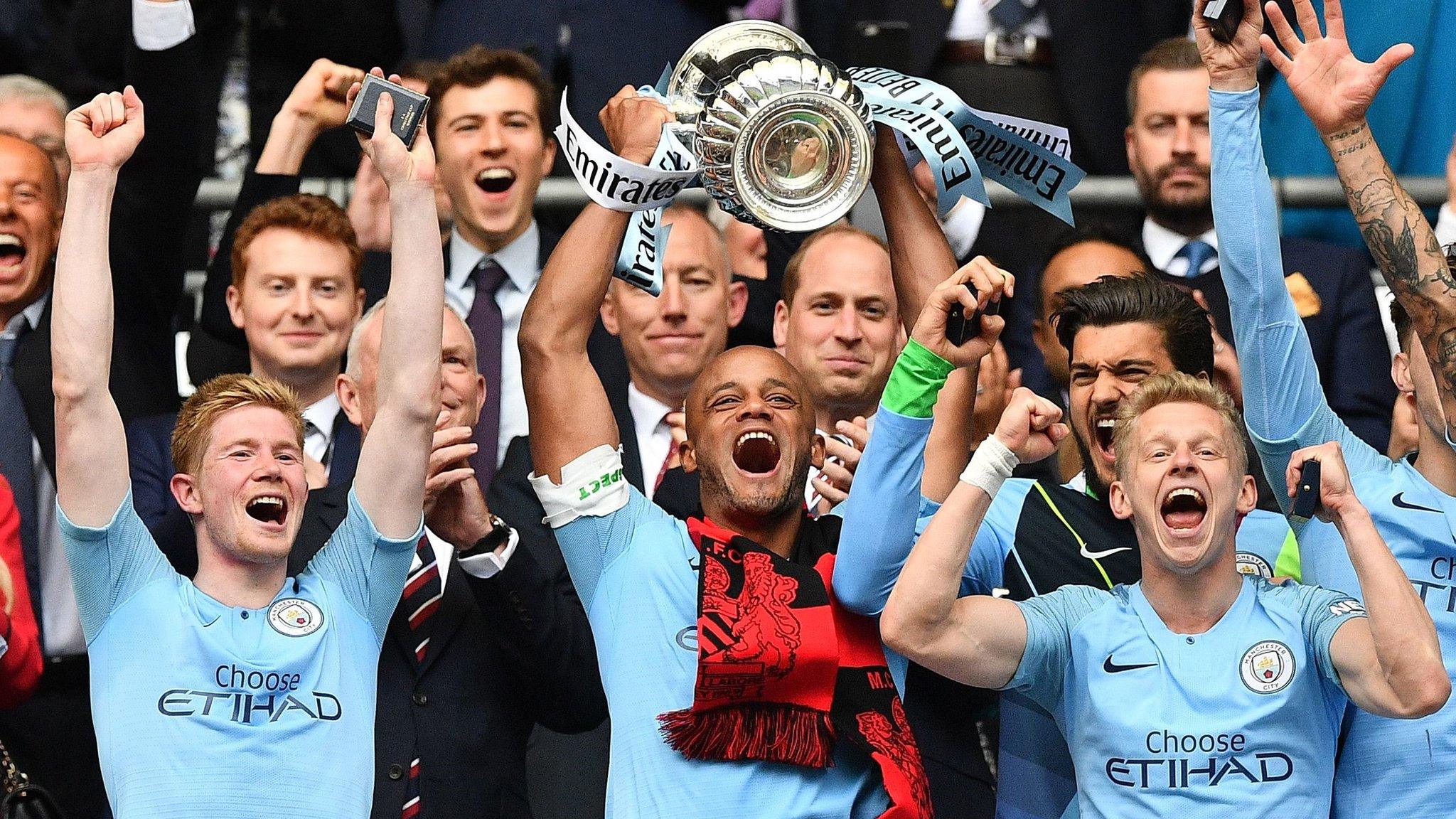 Manchester City players lift FA Cup trophy 2019