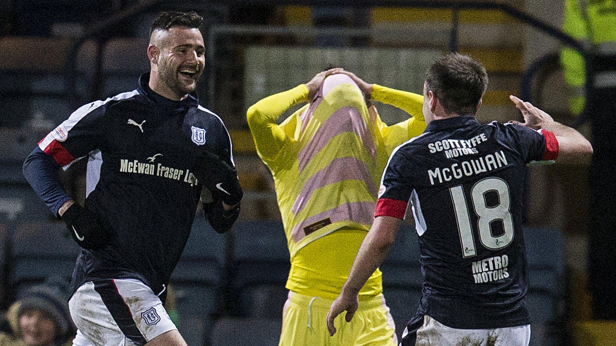 Marcus Haber (left) celebrates Dundee's winner