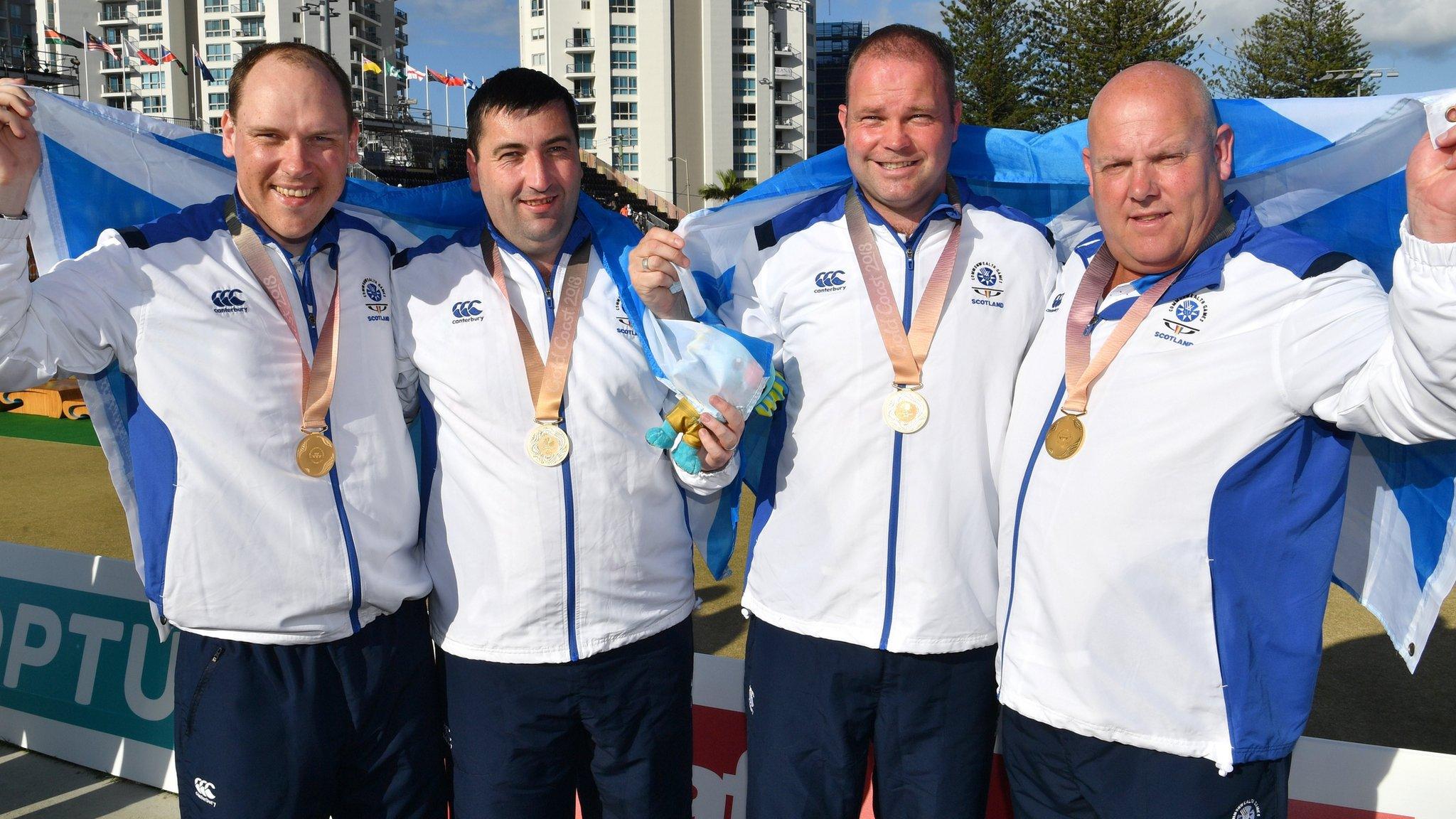 Scotland fours team Ronald Duncan, Derek Oliver, Paul Foster and Alexander Marshall with gold medals