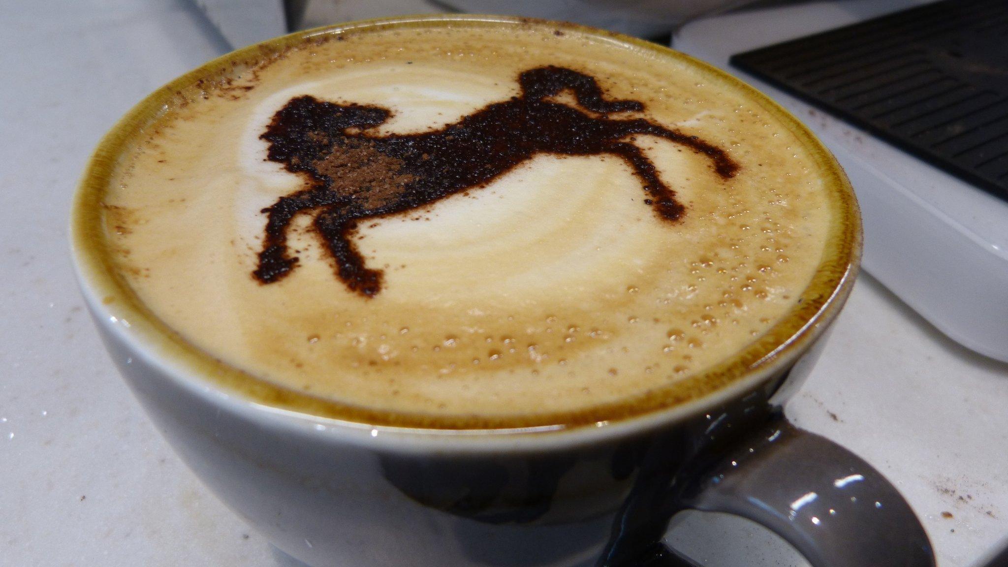 cappuccino with black horse