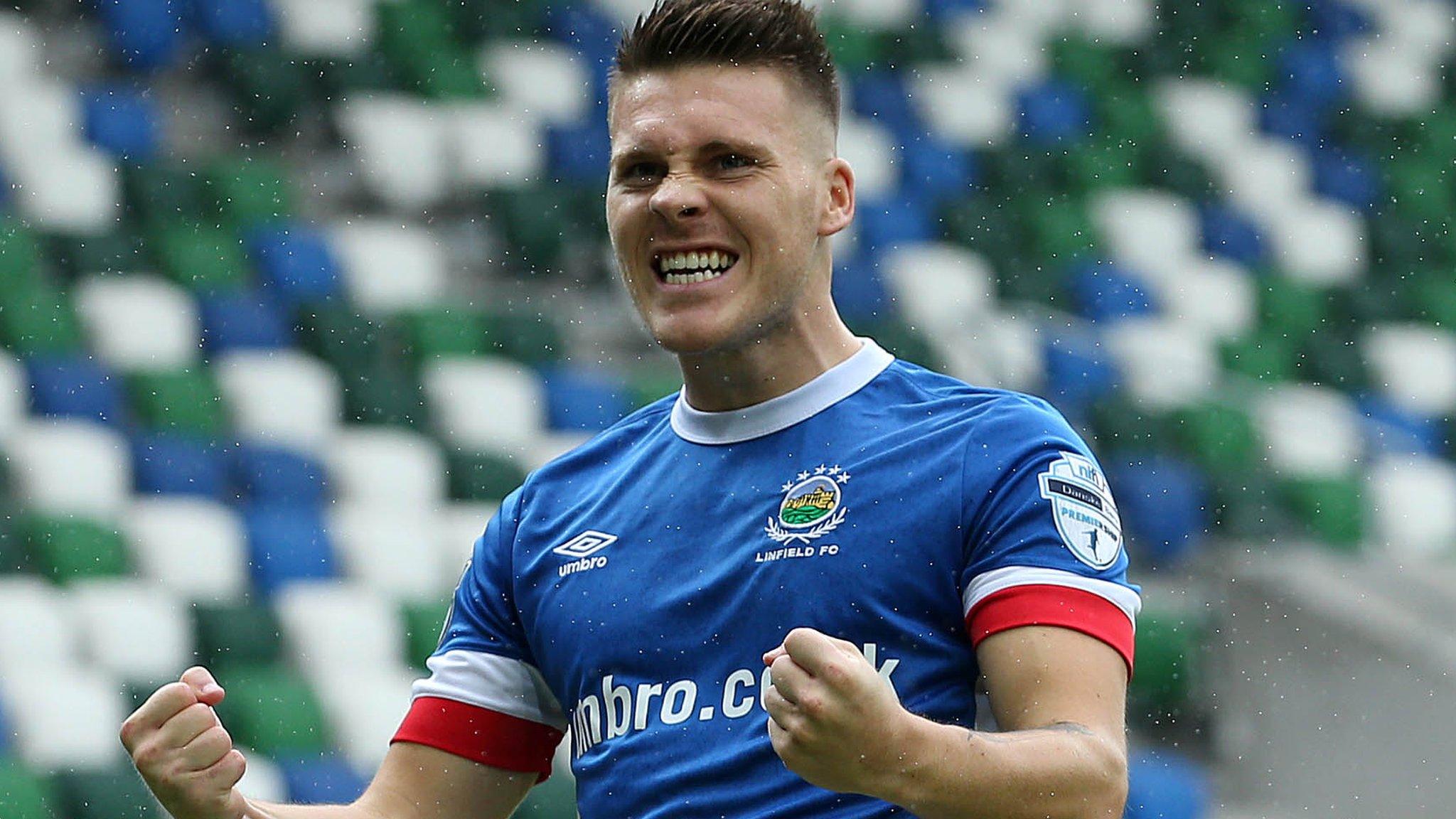 Josh Carson celebrates scoring for Linfield