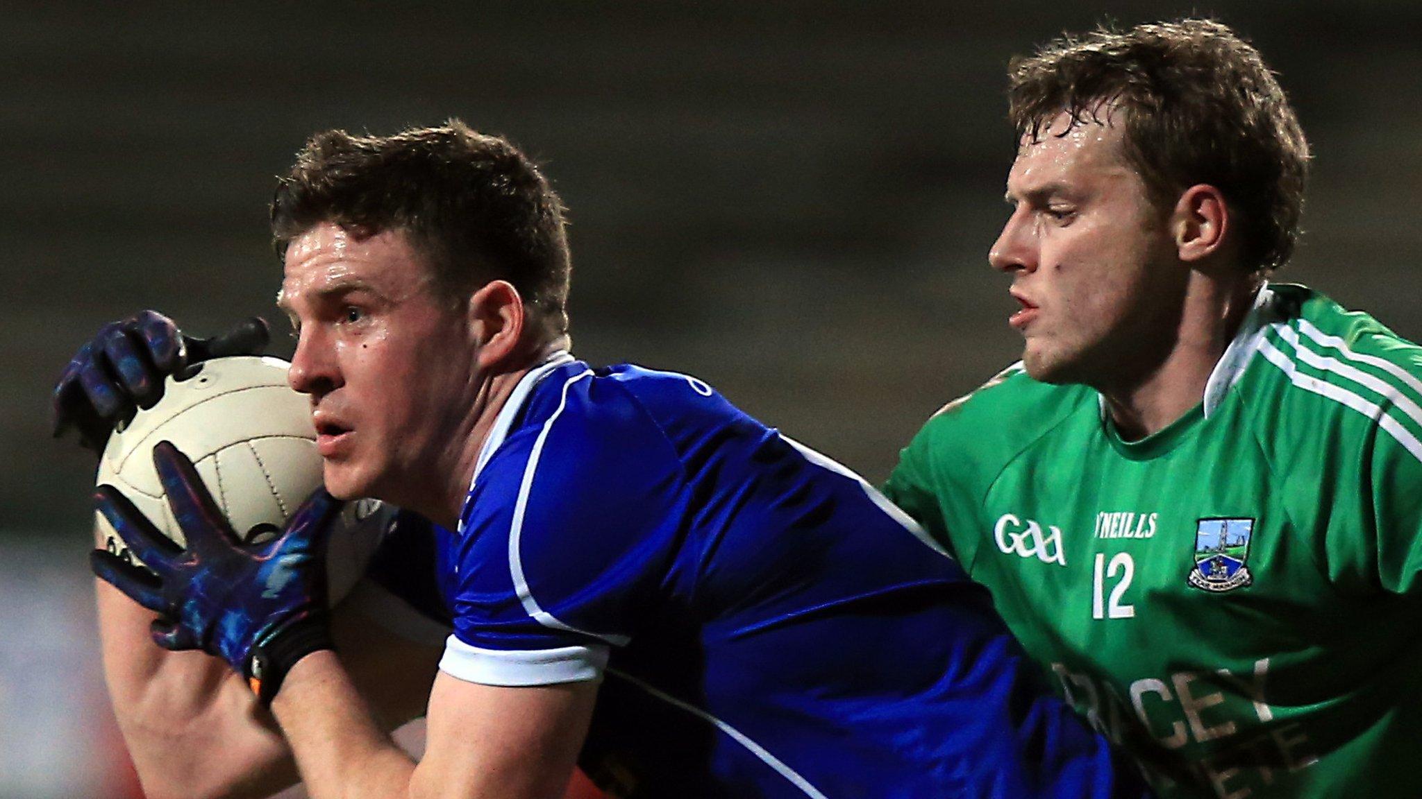 Cavan's Tomas Corr attempts to burst away from Fermanagh's Declan McCusker at Brewster Park