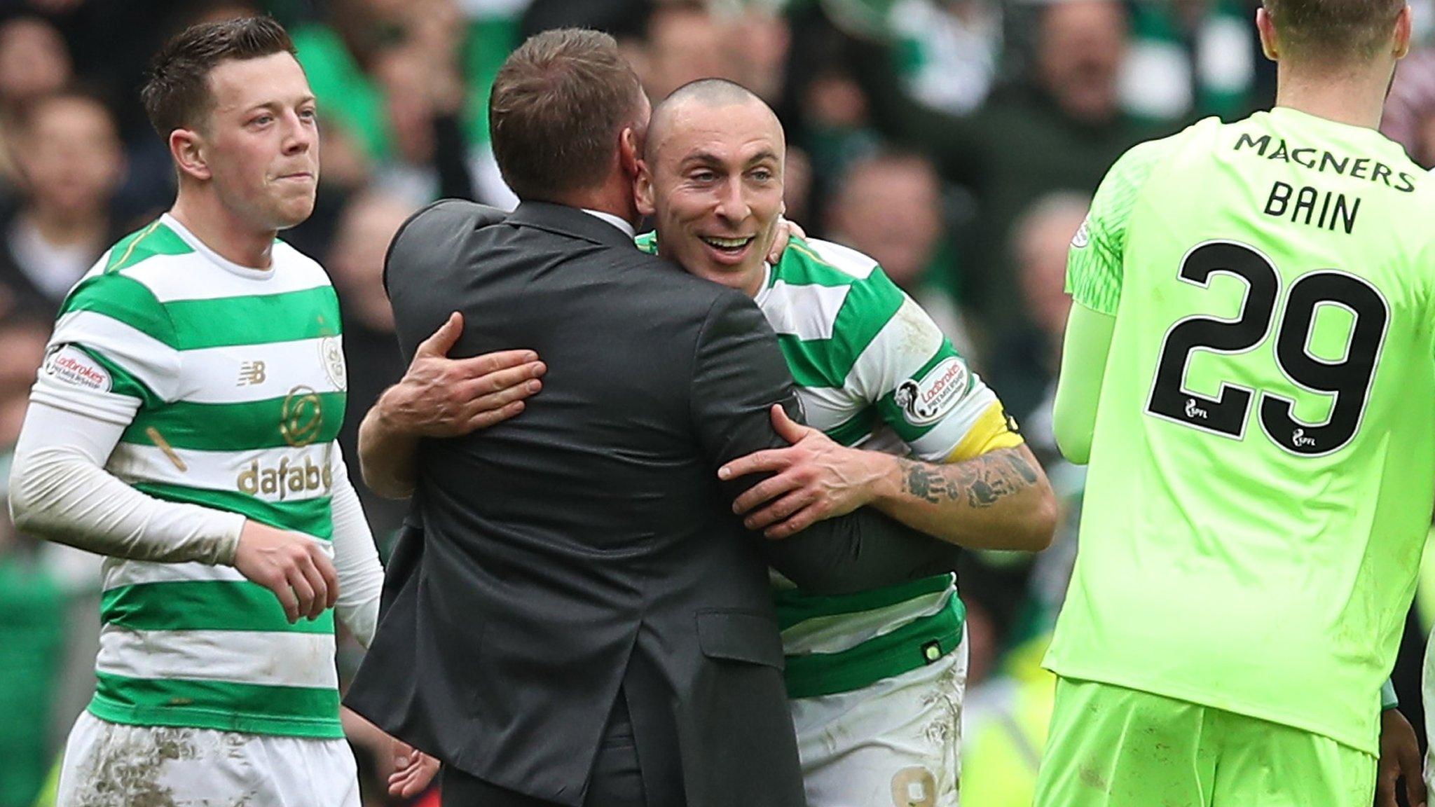 Brendan Rodgers and Scott Brown celebrate after Celtic's win over Rangers