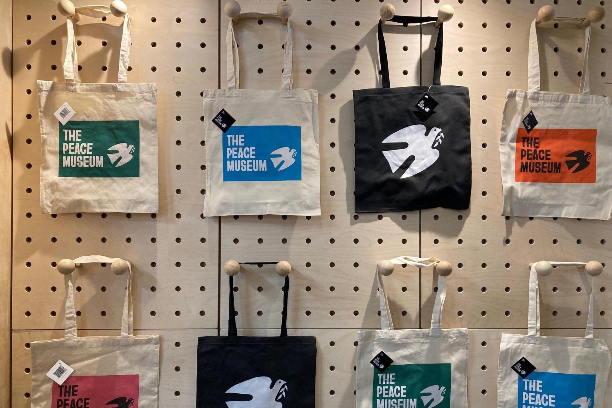 A photo of Peace Museum bags on sale in its gift shop