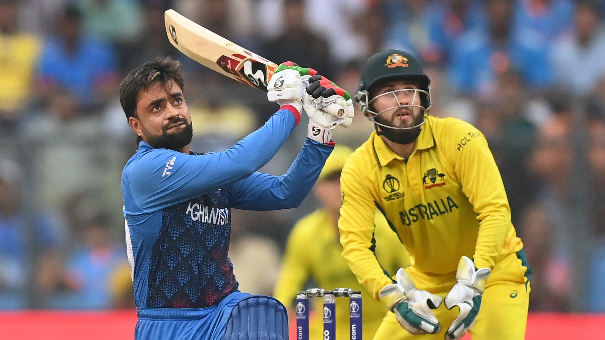 Rashid Khan of Afghanistan playing a shot against Australia at the Cricket World Cup in 2023