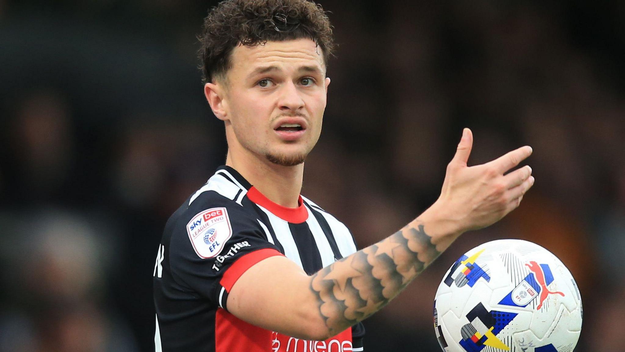 George McEachran in action for Grimsby Town