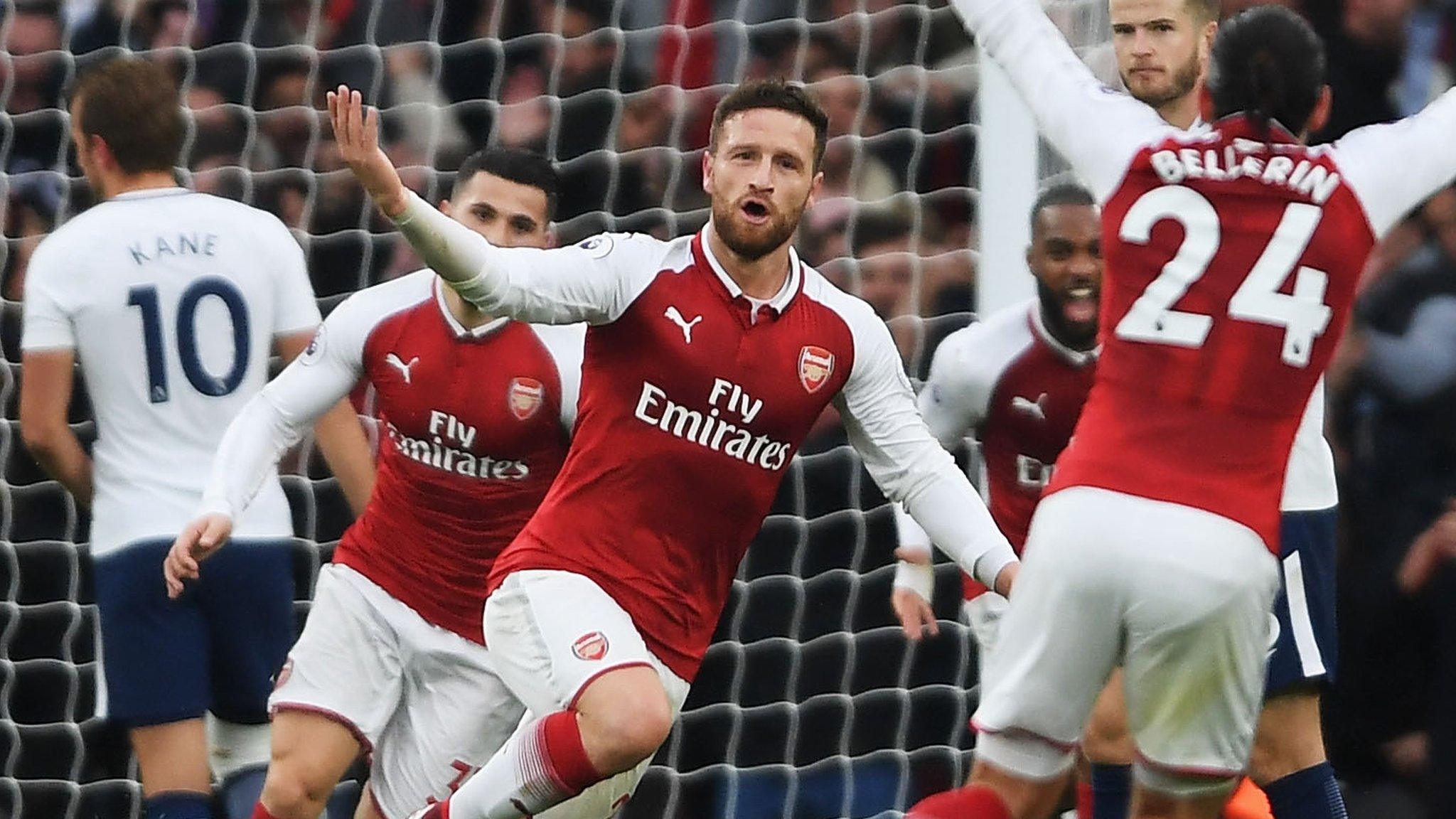 Shkodran Mustafi celebrates scoring for Arsenal against Tottenham