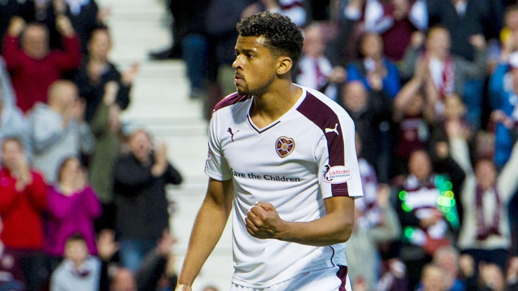 Osman Sow celebrates one of his two goals at Tynecastle