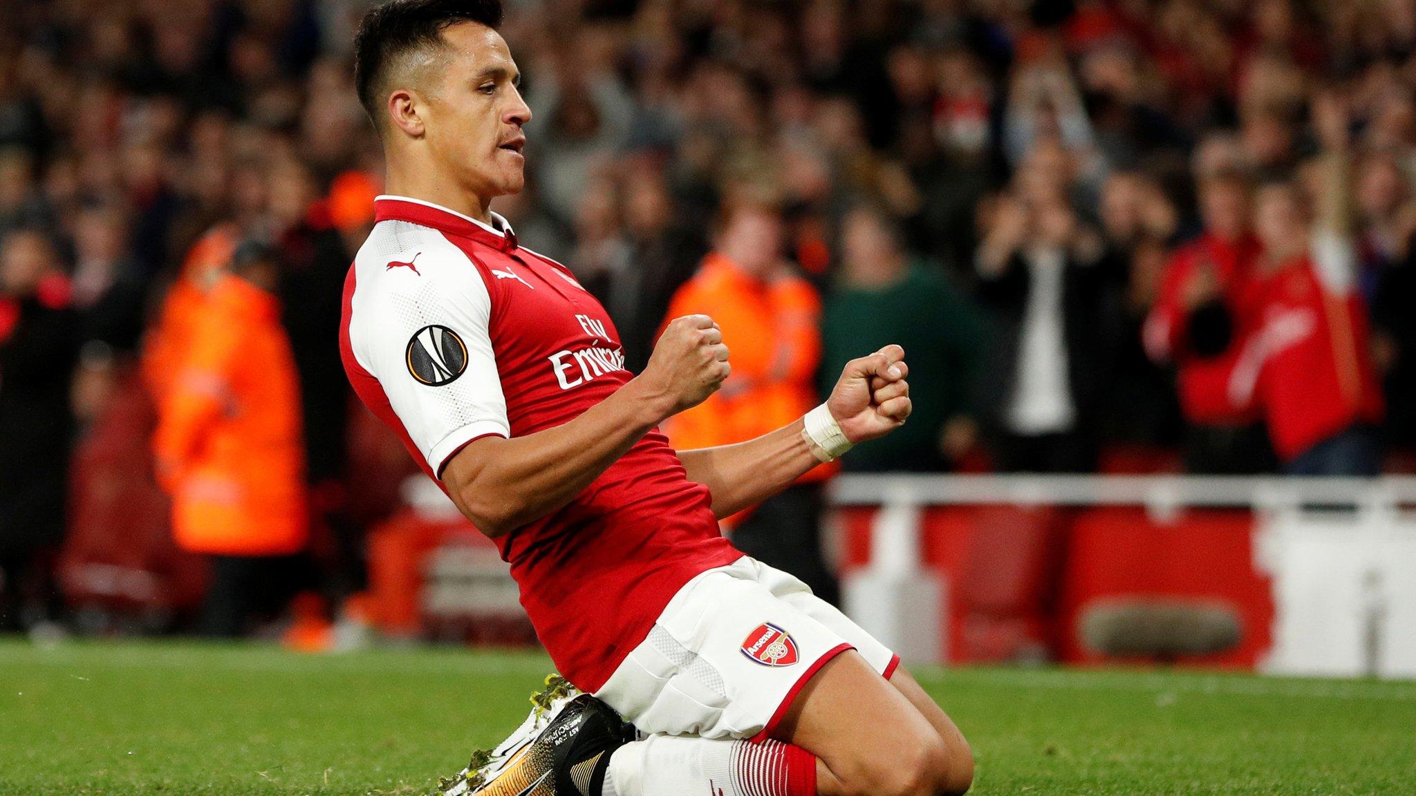 Alexis Sanchez celebrates scoring