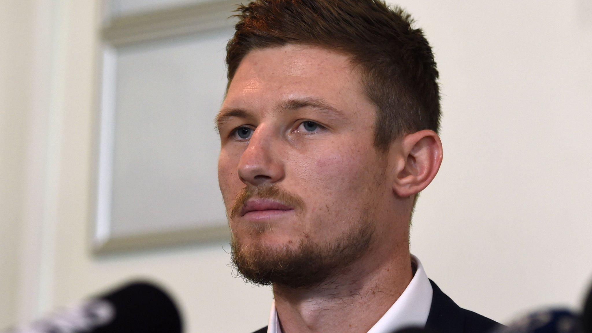 Australia batsman Cameron Bancroft prepares to speak at a news conference