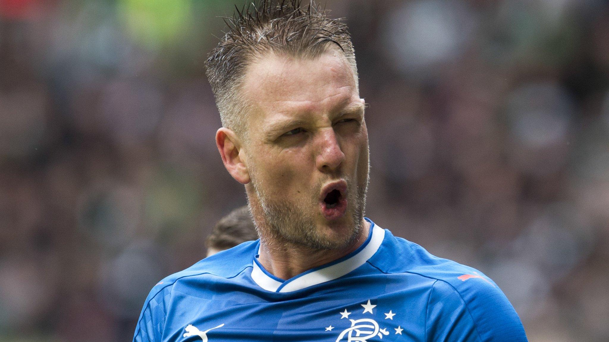 Rangers scorer Clint Hill celebrates