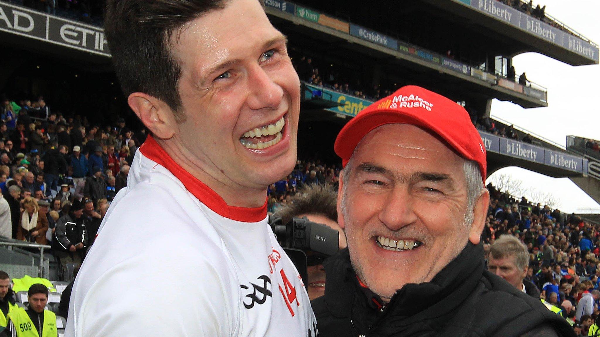 Tyrone manager Mickey Harte embraces Sean Cavanagh after his team's Football League Division Two final win over Cavan