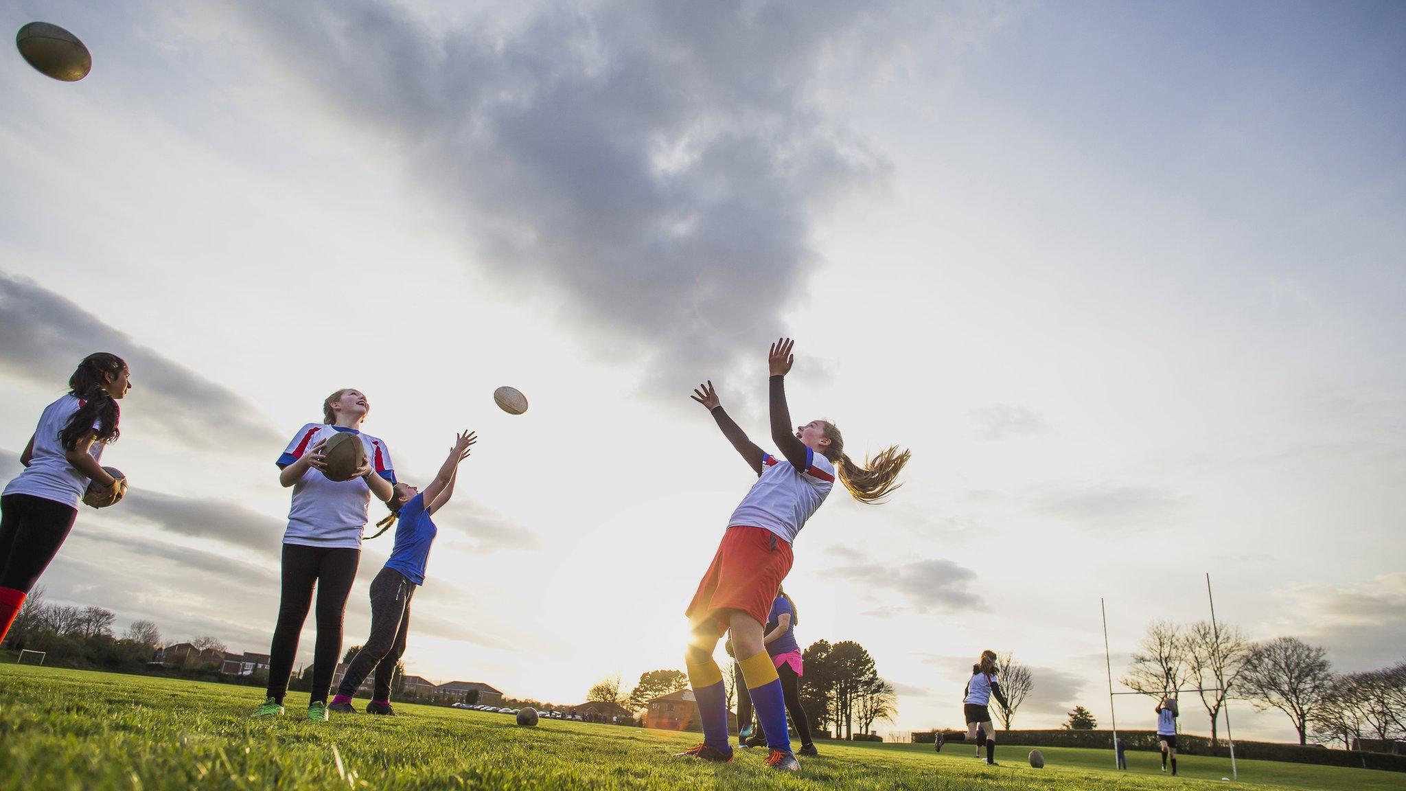 girls playing rugby