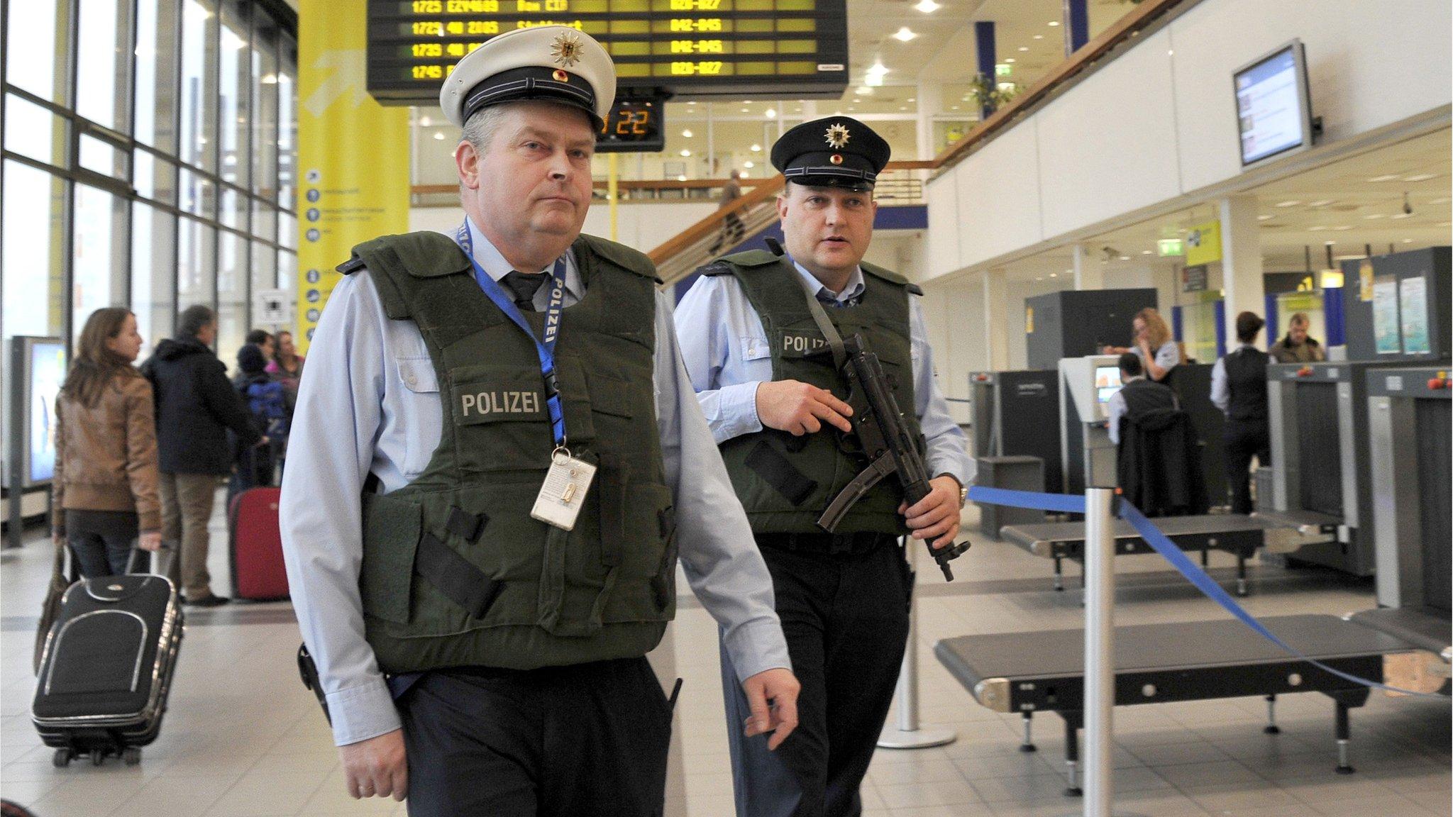 Two policemen patrol at Berlin-Schoenefeld airport (November 2010)