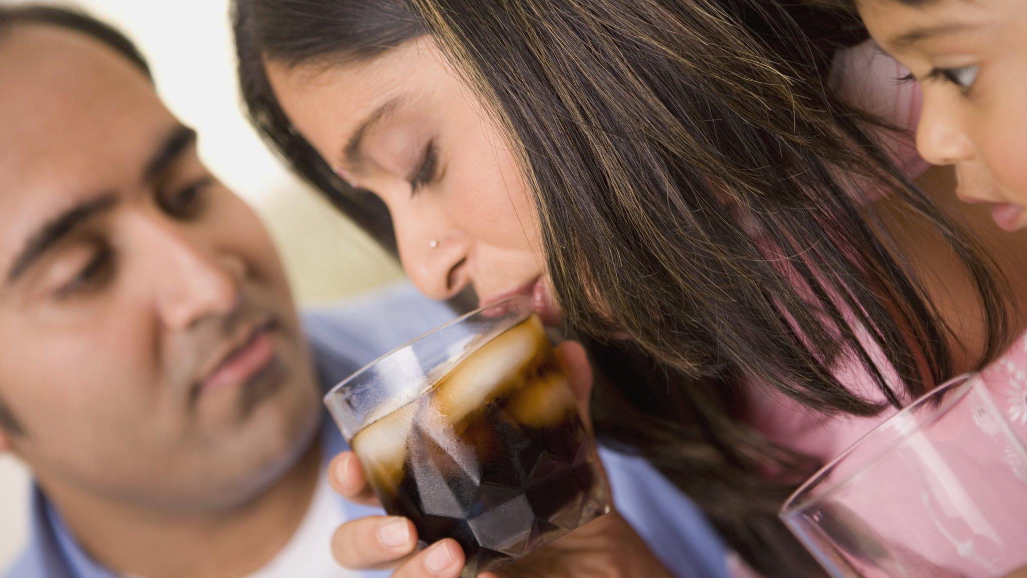 Woman drinking pop