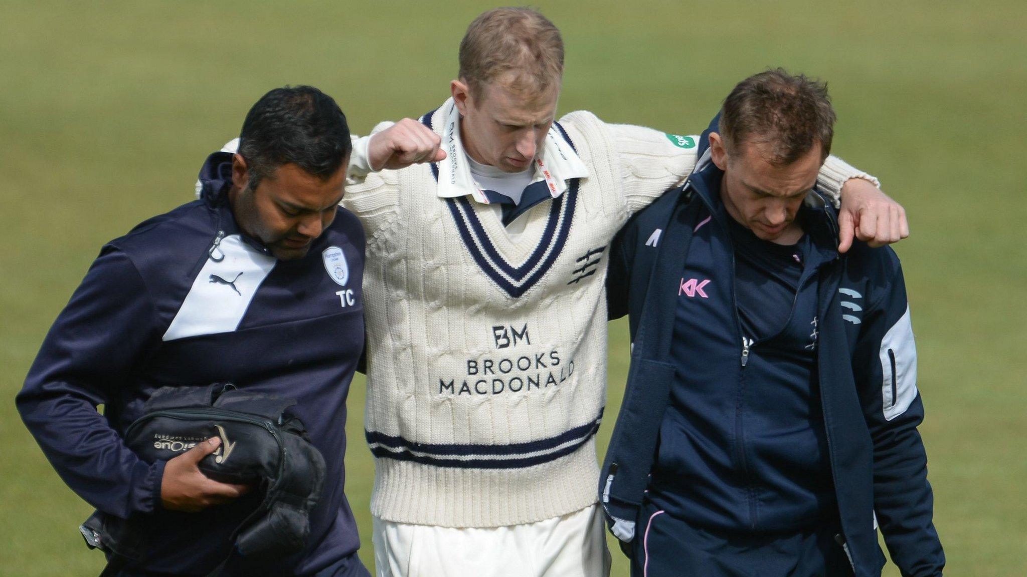 Adam Voges is helped from the field