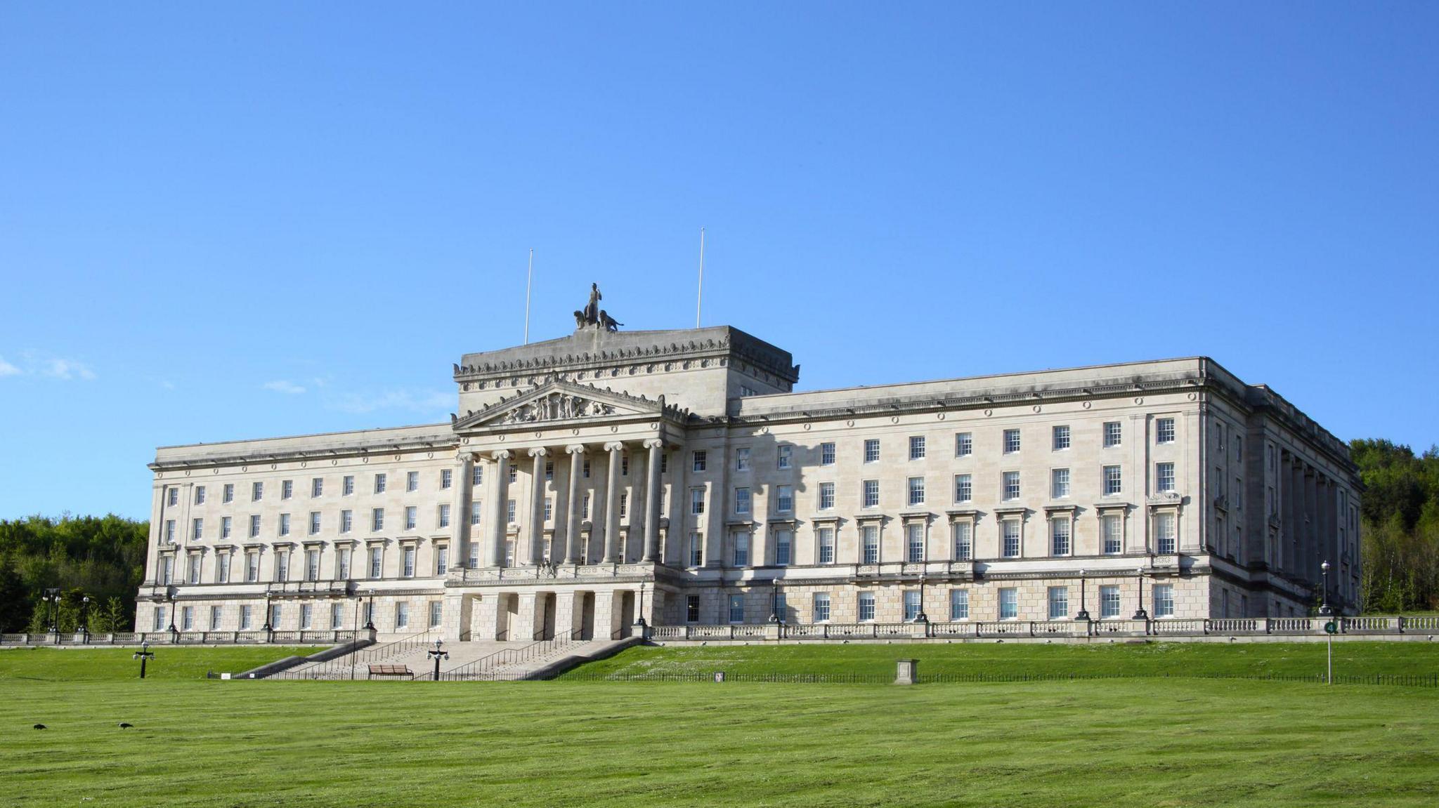 The Parliament Building at Stormont, with a blue sky in the background.