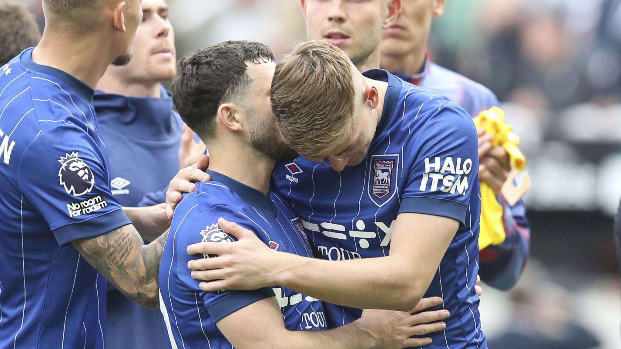 Liam Delap and Conor Chaplin of Ipswich Town are seen at full time as Ipswich Town are relegated from the Premier League after a 3-0 defeat by Newcastle United