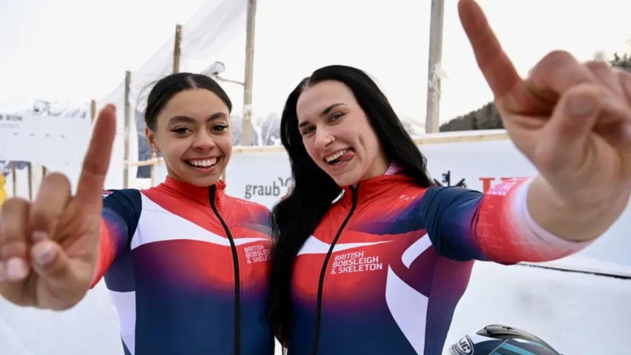 Great Britain bobsledders Kya Placide and Adele Nicoll celebrate gold in St Moritz