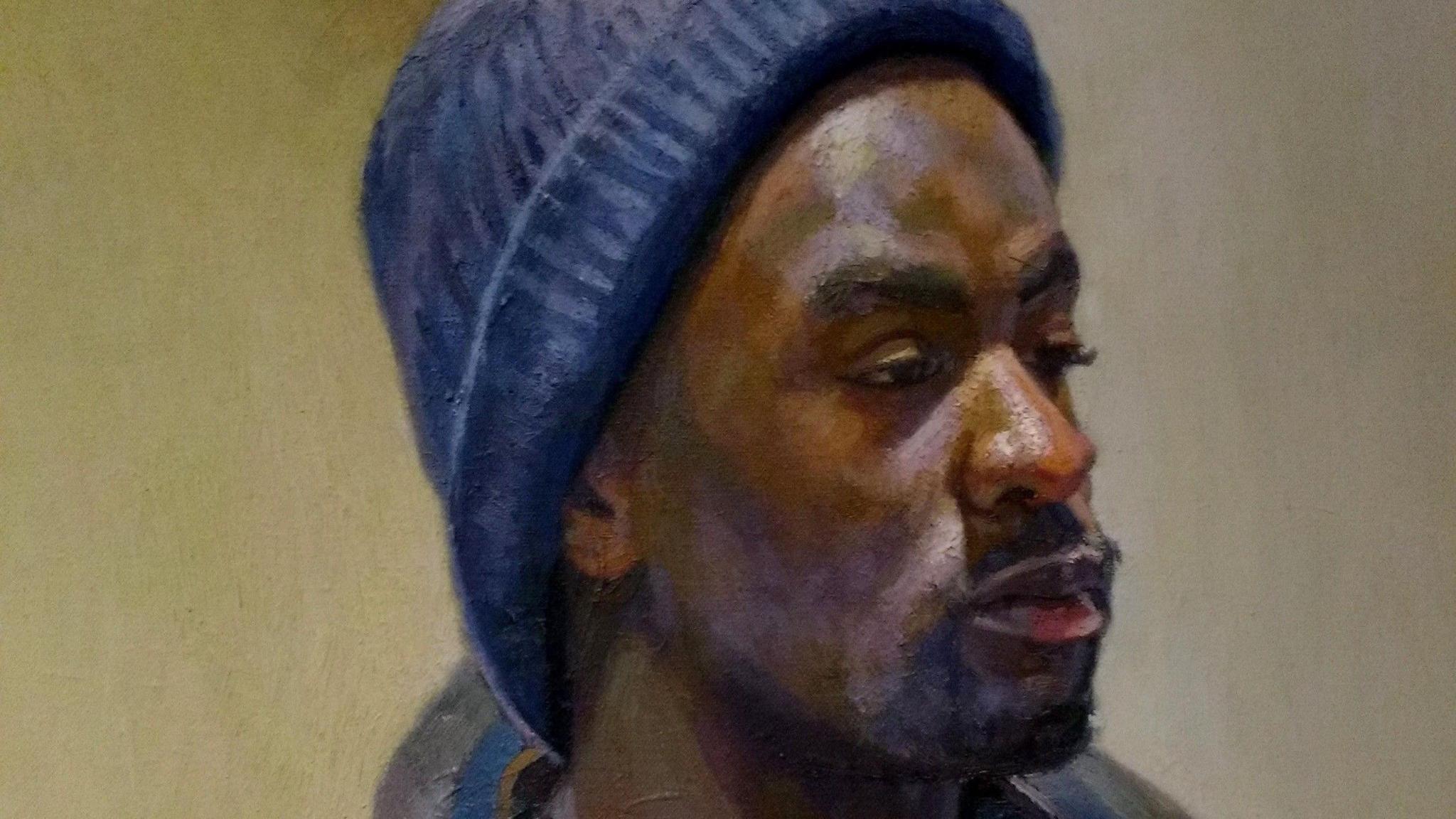 A head and shoulders painting of a man in a blue zip top fleece jacket and matching blue beanie hat.  He looks to the right of the picture.