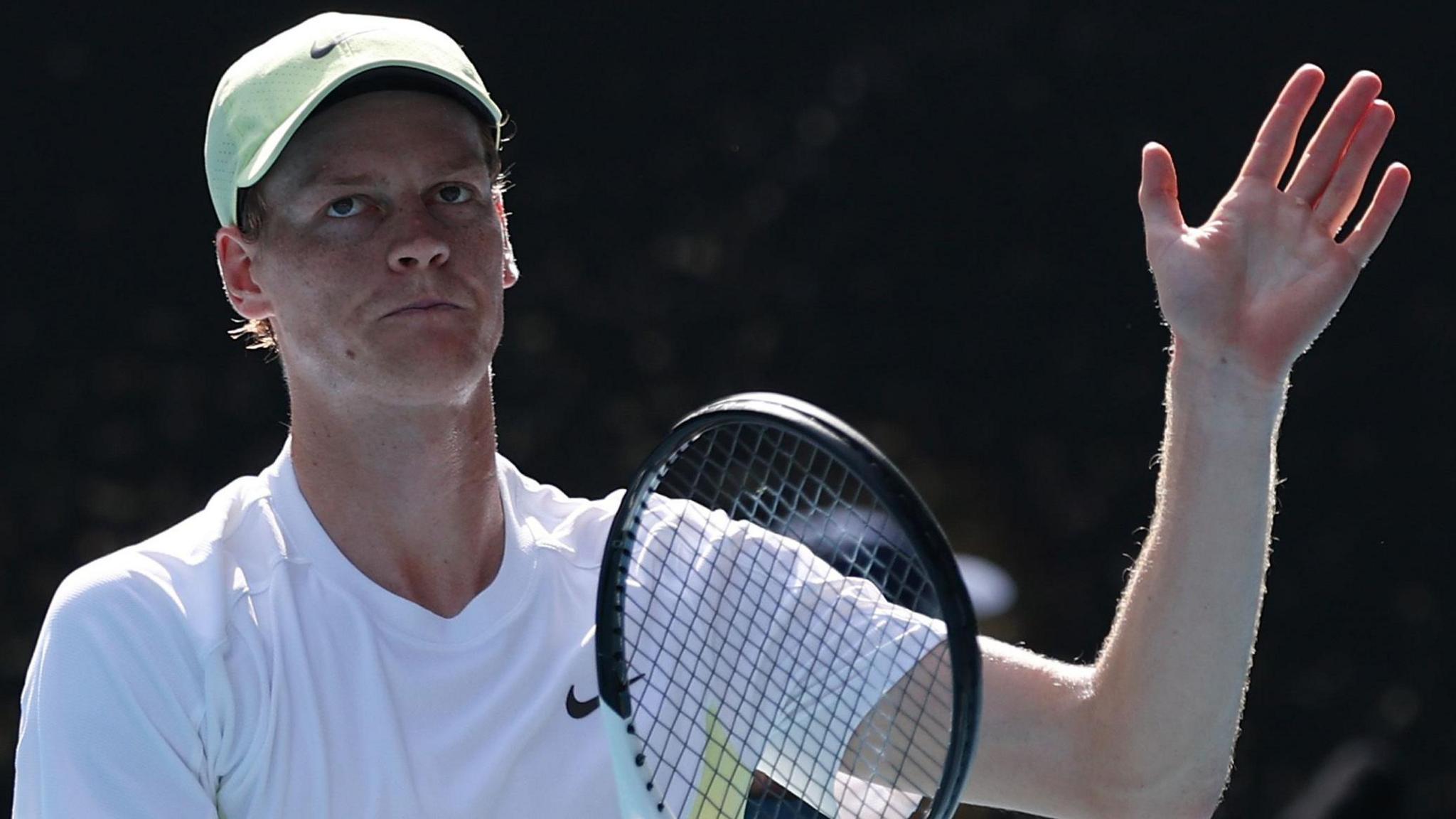 Jannik Sinner thanks the crowd after his win at the Australian Open