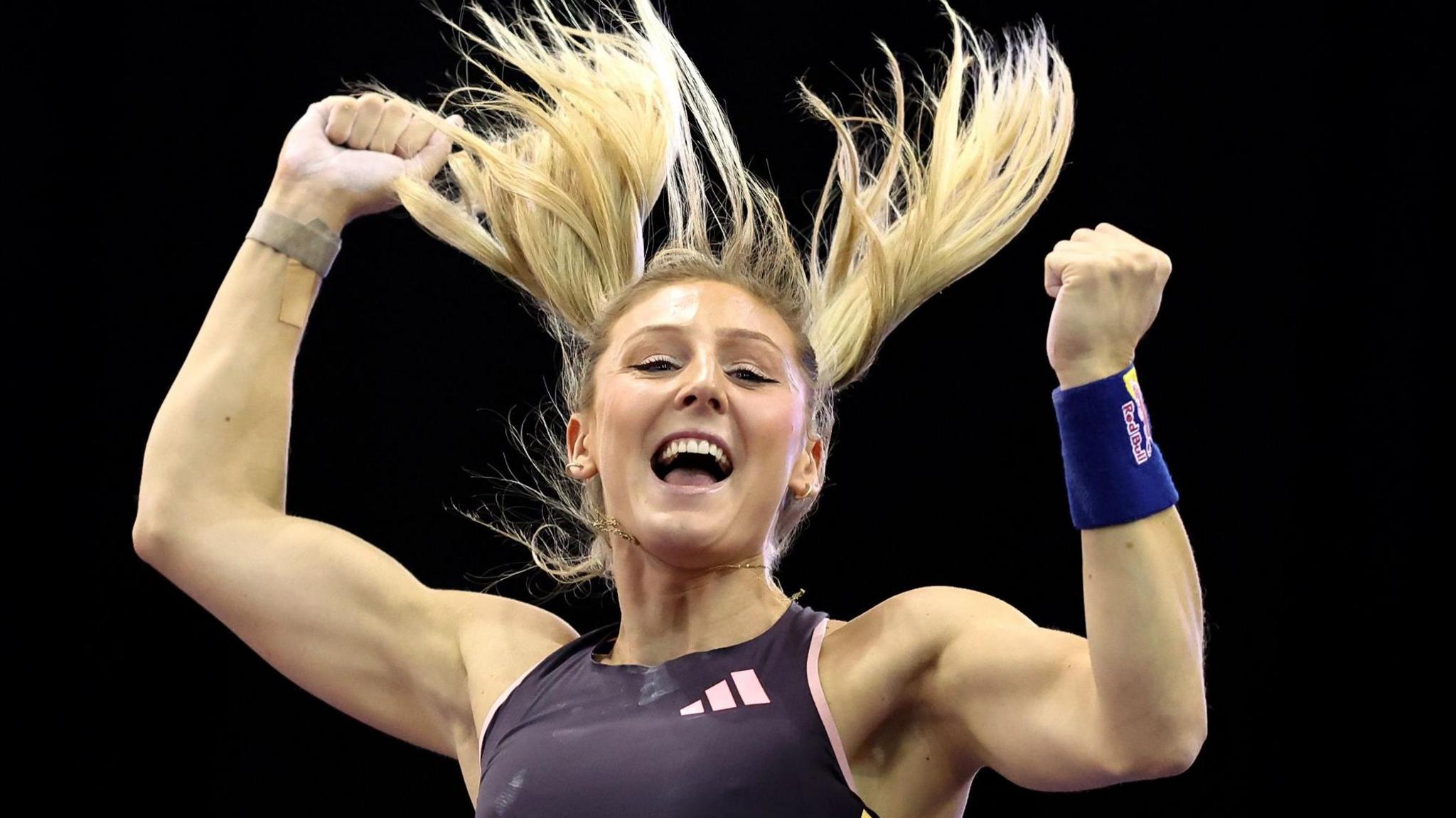 Molly Caudery celebrates after clearing 4.85m in Madrid in February