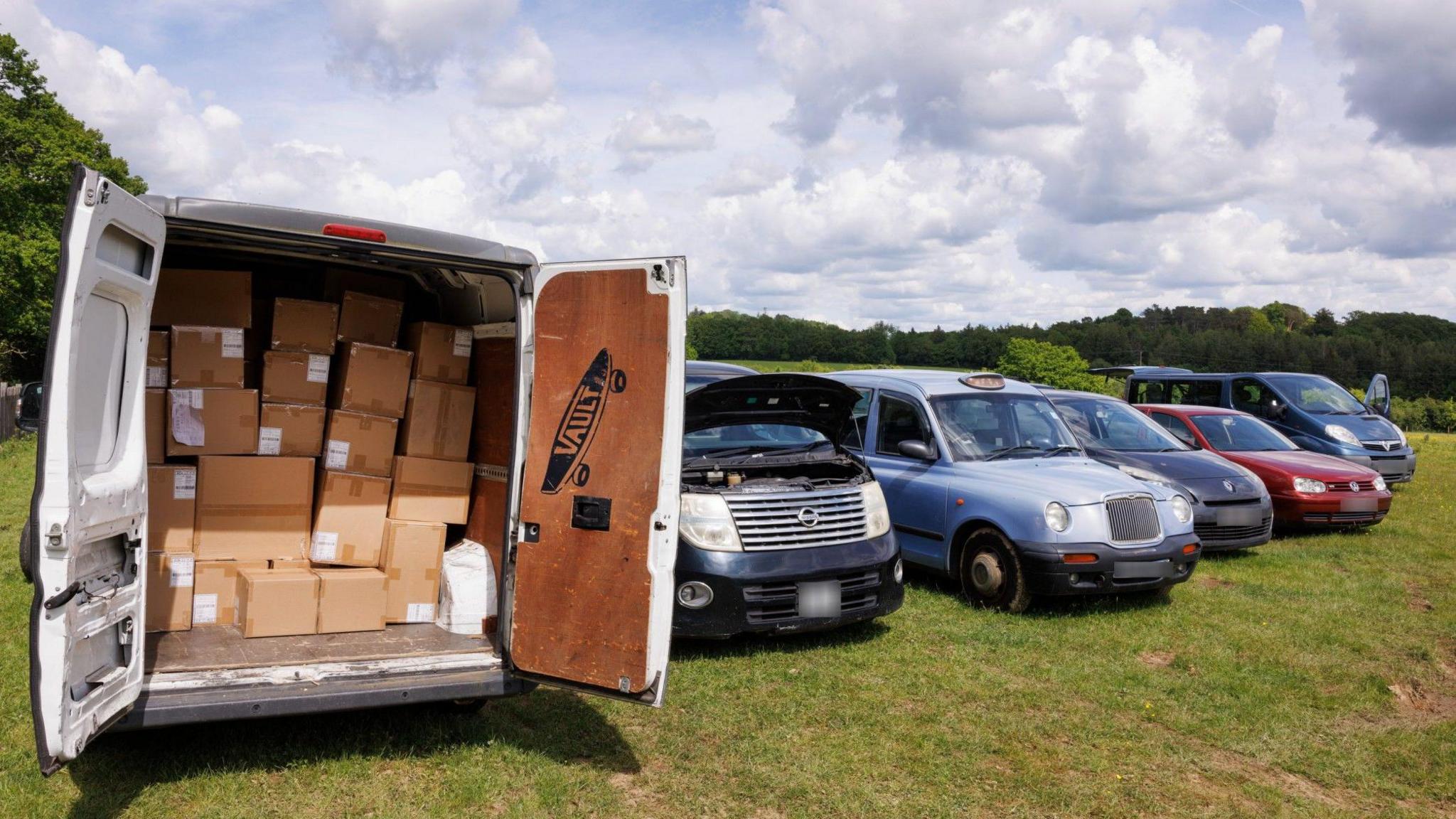 Van and cars heading to Ukraine