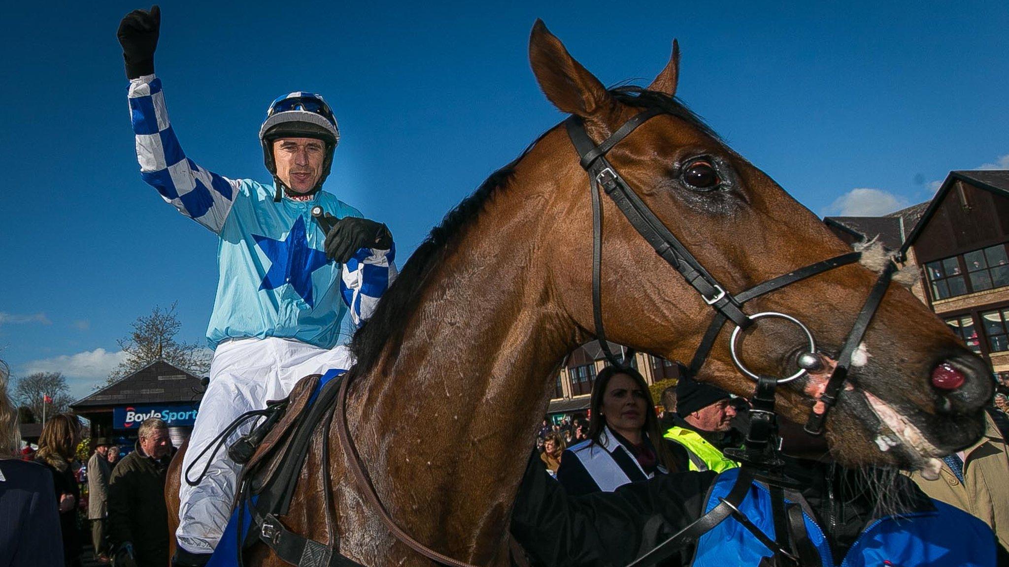 Paddy Brennan celebrates the Champion Chase victory on God's Own