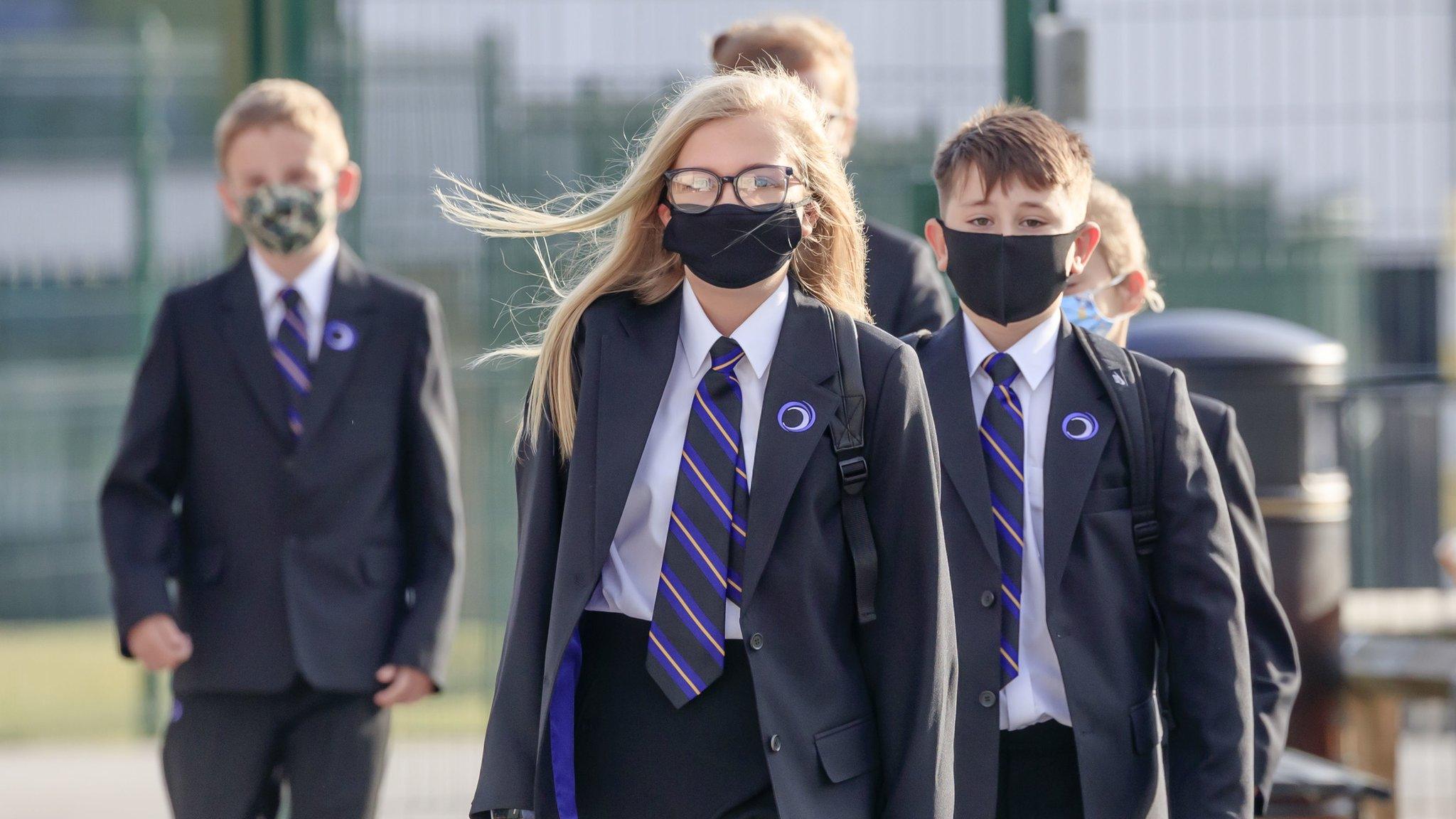 school children wearing face masks