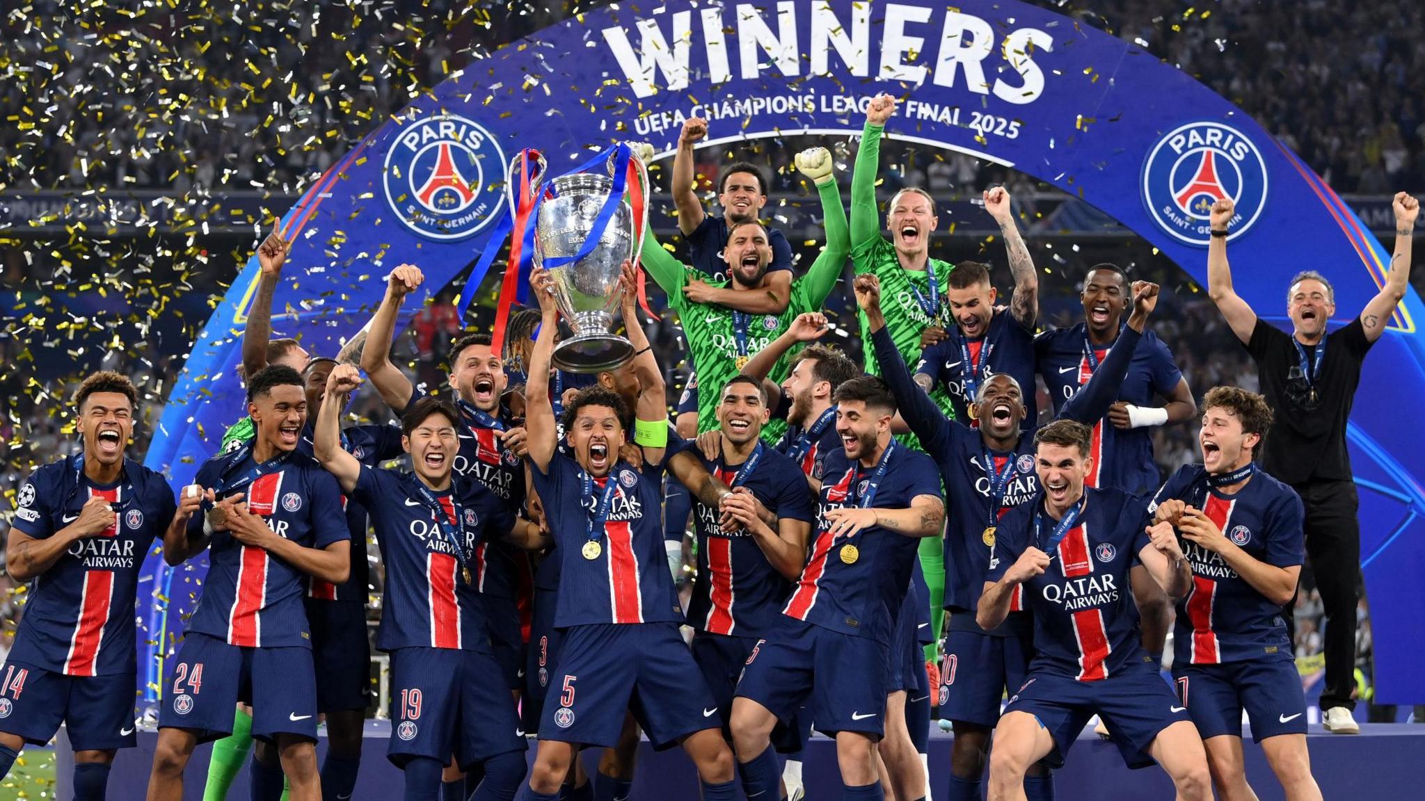 Paris St-Germain celebrate with the Ligue 1 trophy