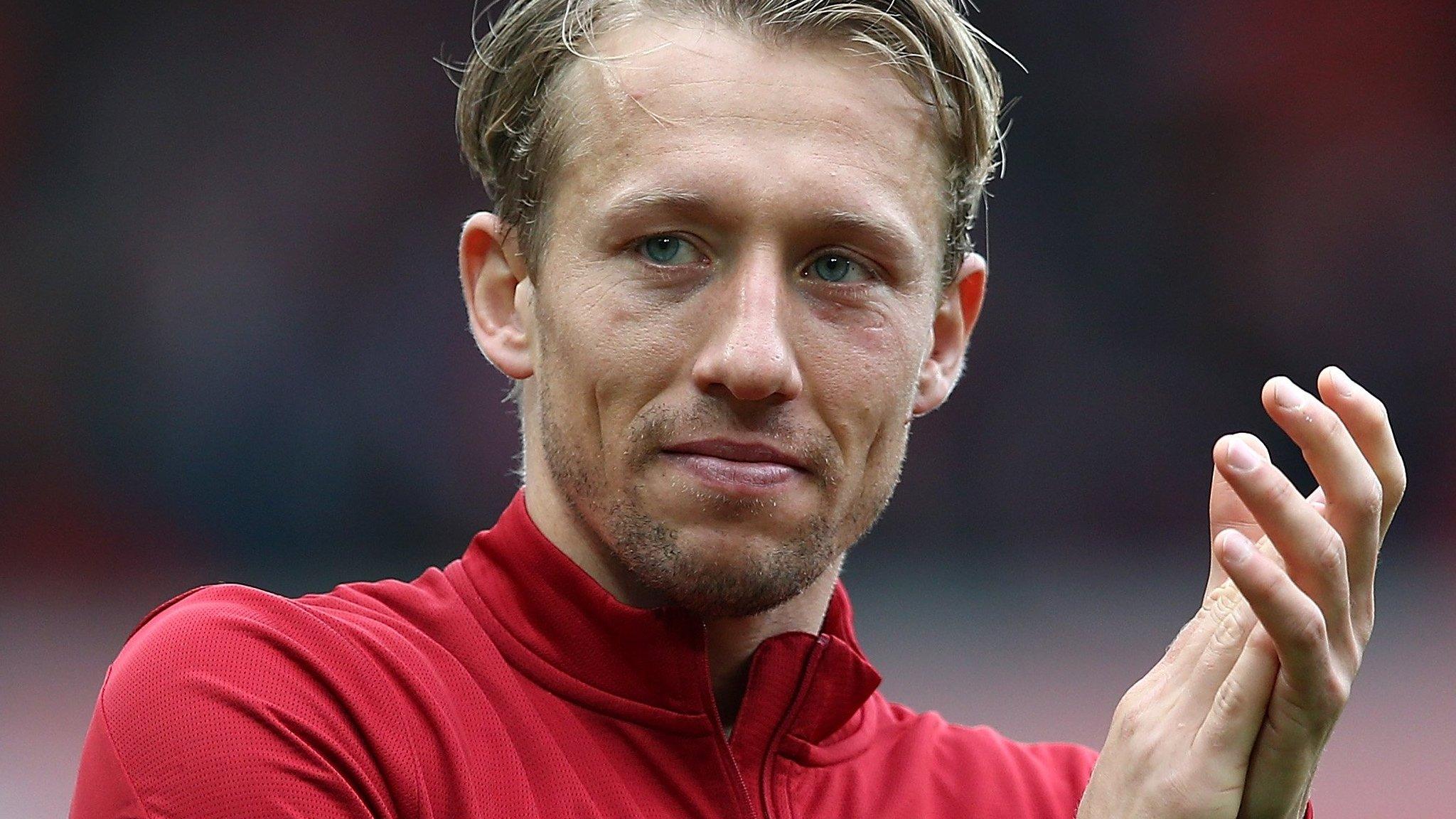 Lucas applauds the Anfield crowd