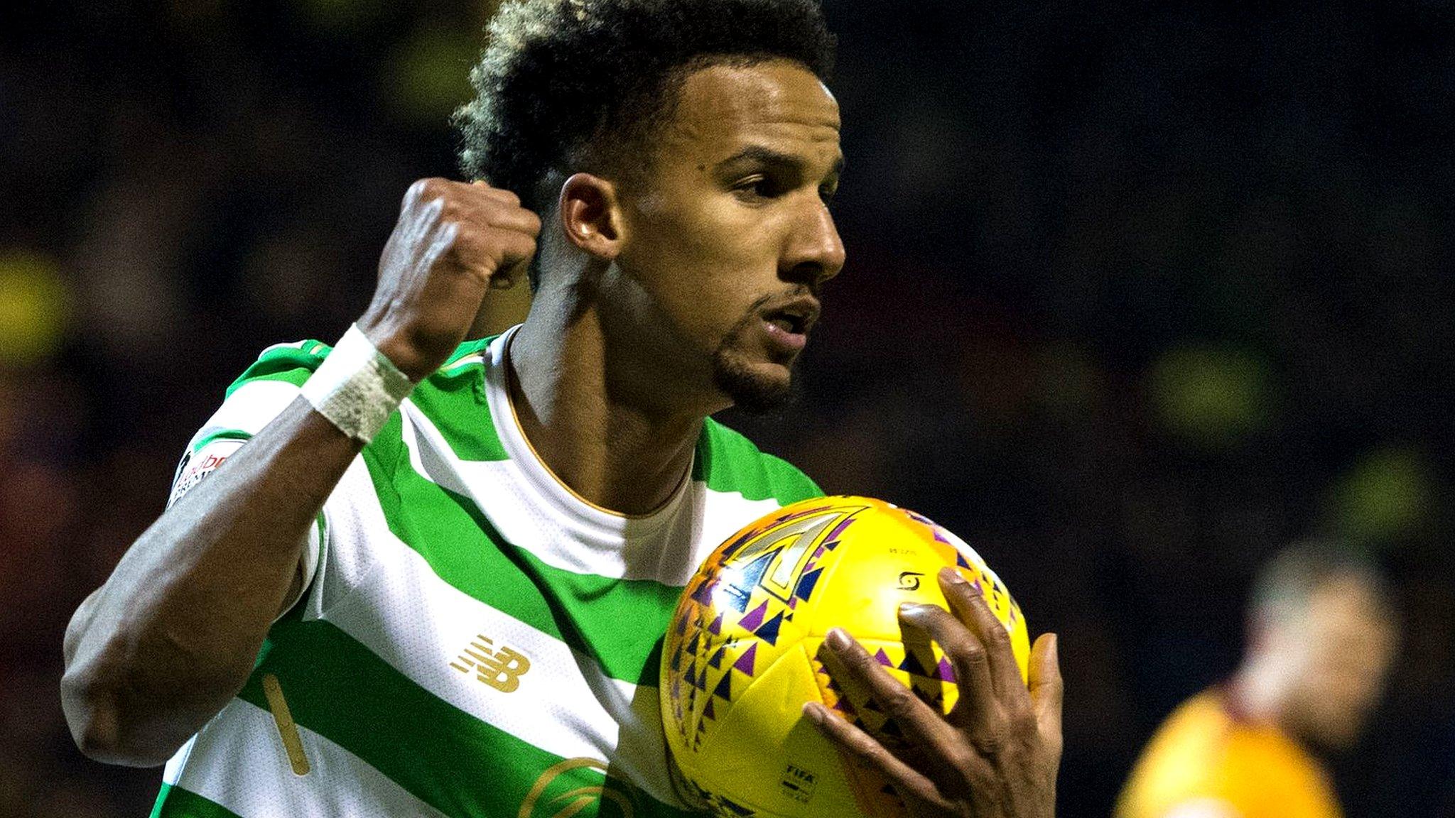 Scott Sinclair celebrates his late penalty