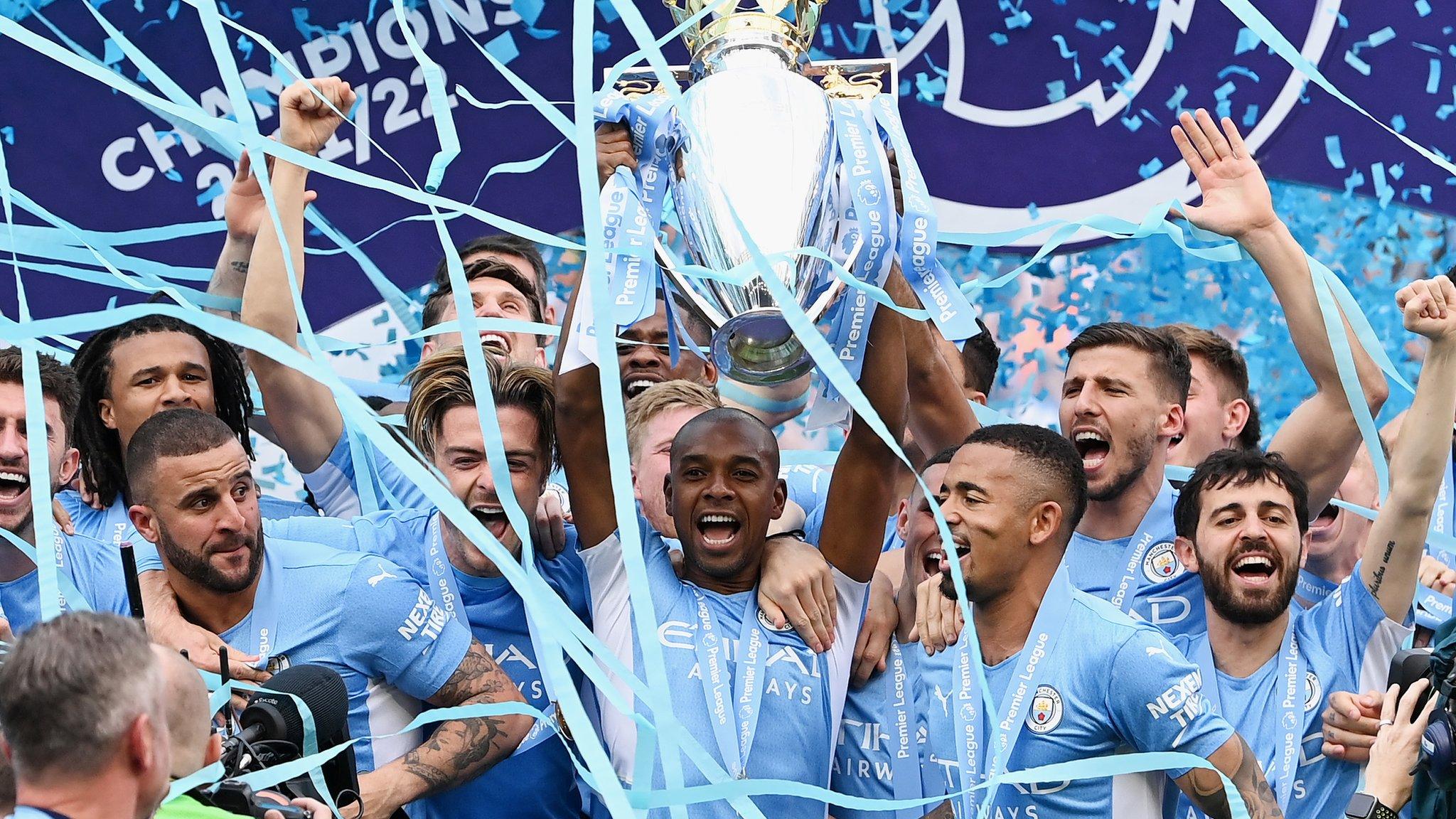 Manchester City with Premier League trophy