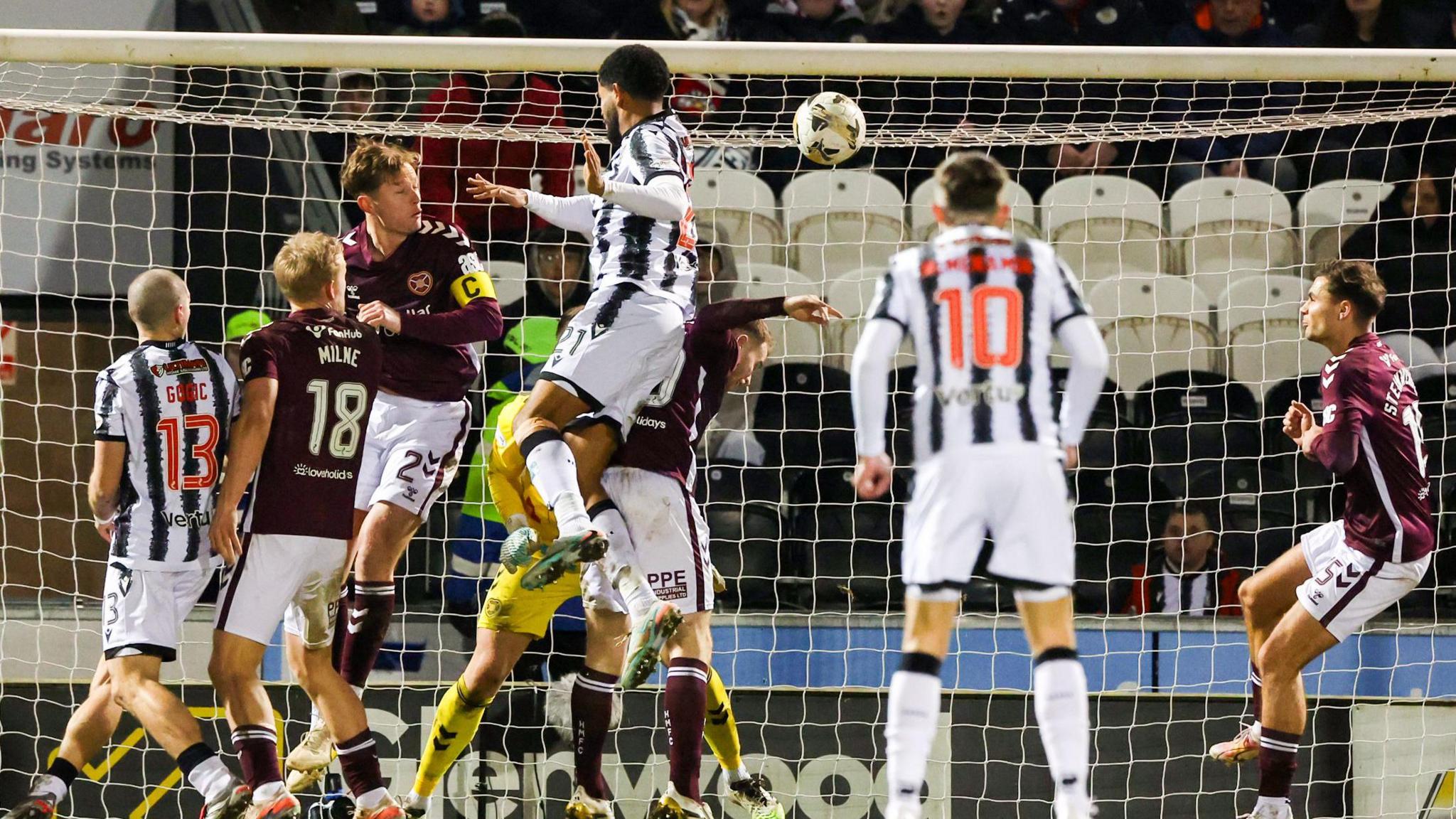 Miguel Freckleton rises to score